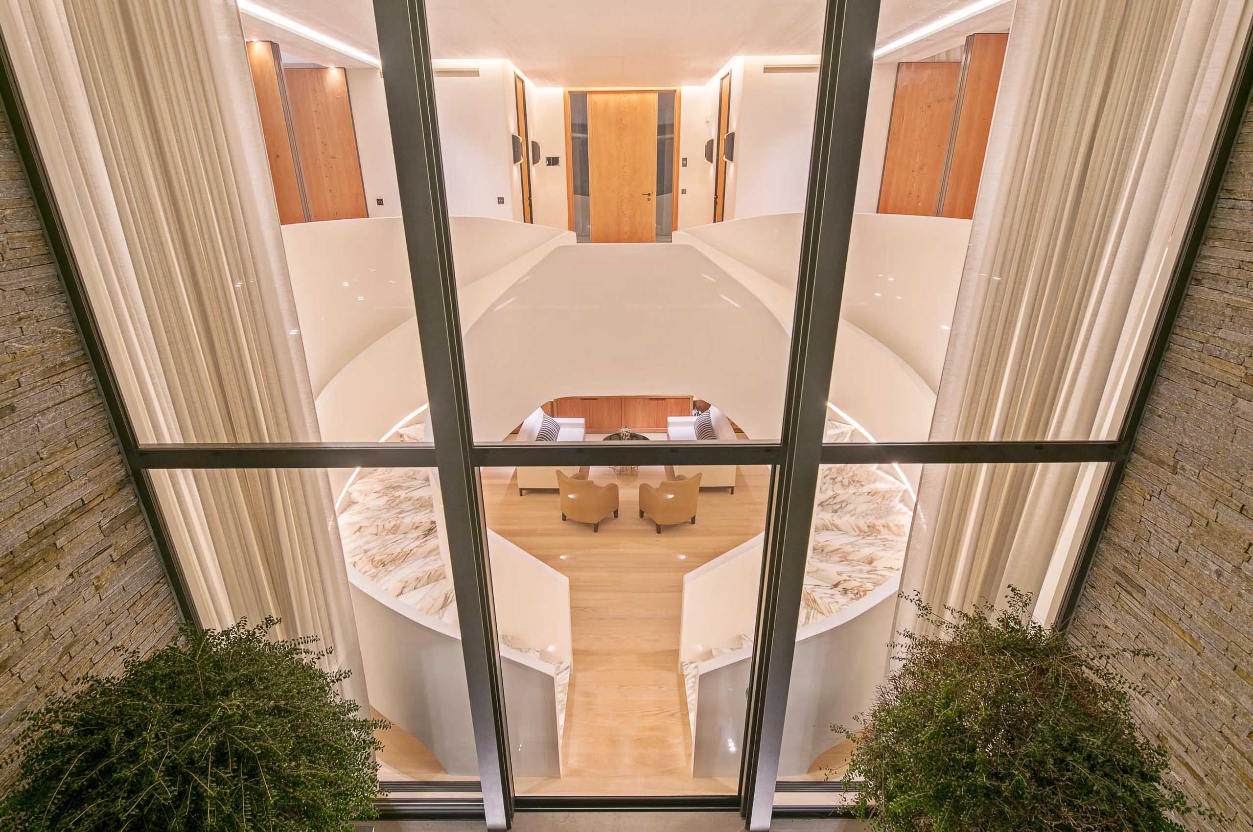 Villa-Ivy-staircase-modern-luxury-exterior-night-Sttropez