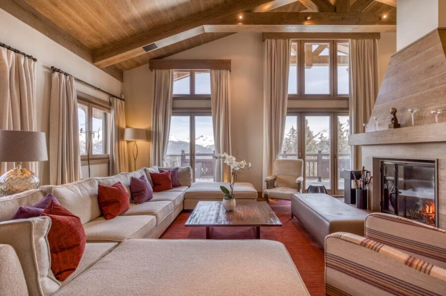 chalet-sheena-living-room-fireplace-sofa-mountain-view-luxury-courchevel1850
