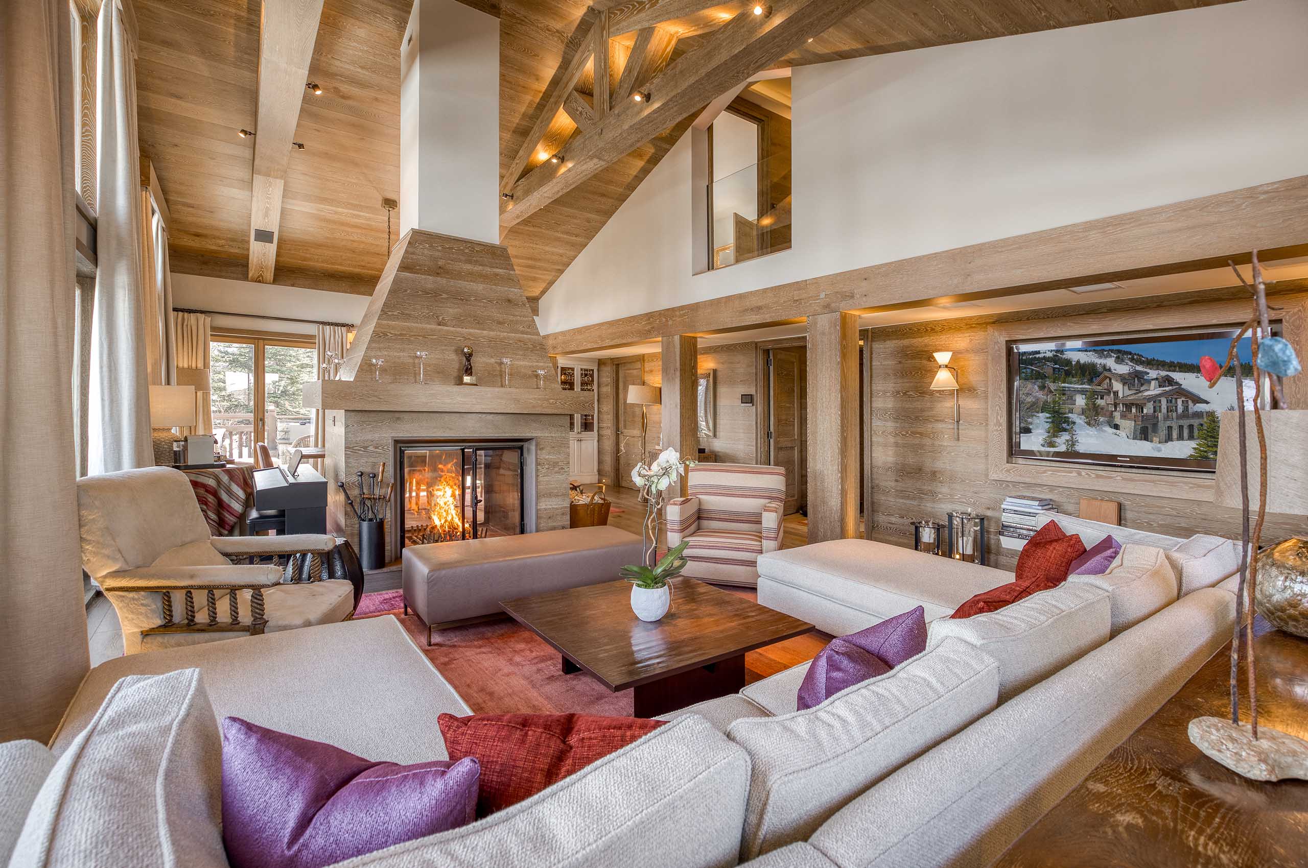 chalet-sheena-mainpage-livingroom-fireplace-luxury-interior-courchevel1850