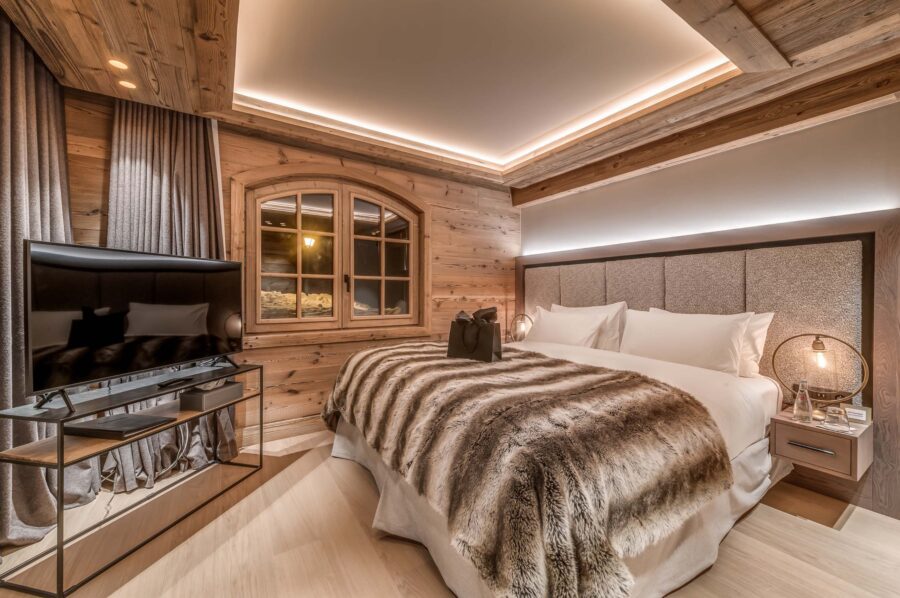 Chalet-nama-bedroom-apline-luxury-design-tv-scenicviews-Courchevel1850