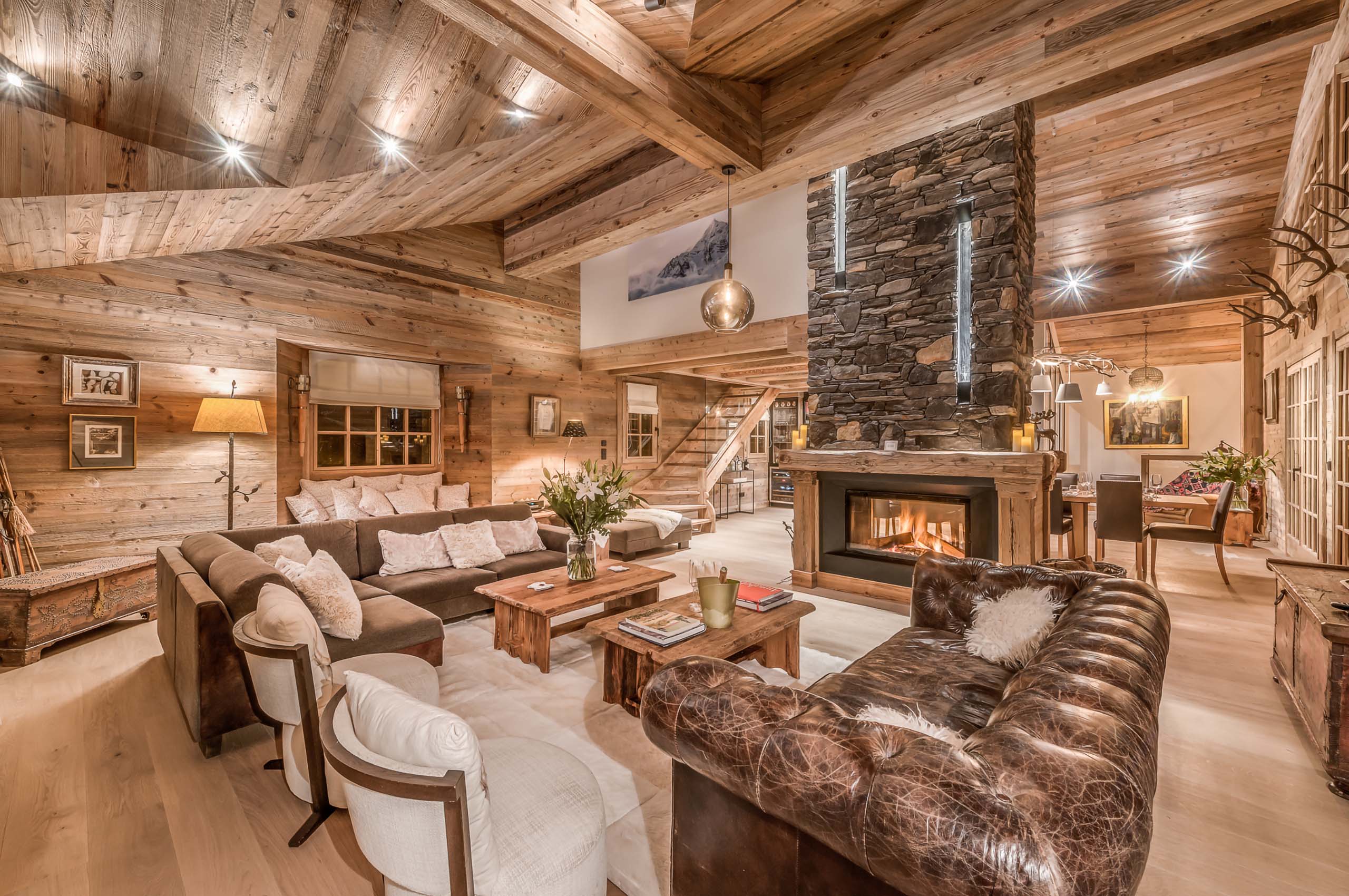 Chalet-nama-livingroom-fireplace-cosy-alpine-luxury-interiordesign-courchevel1850