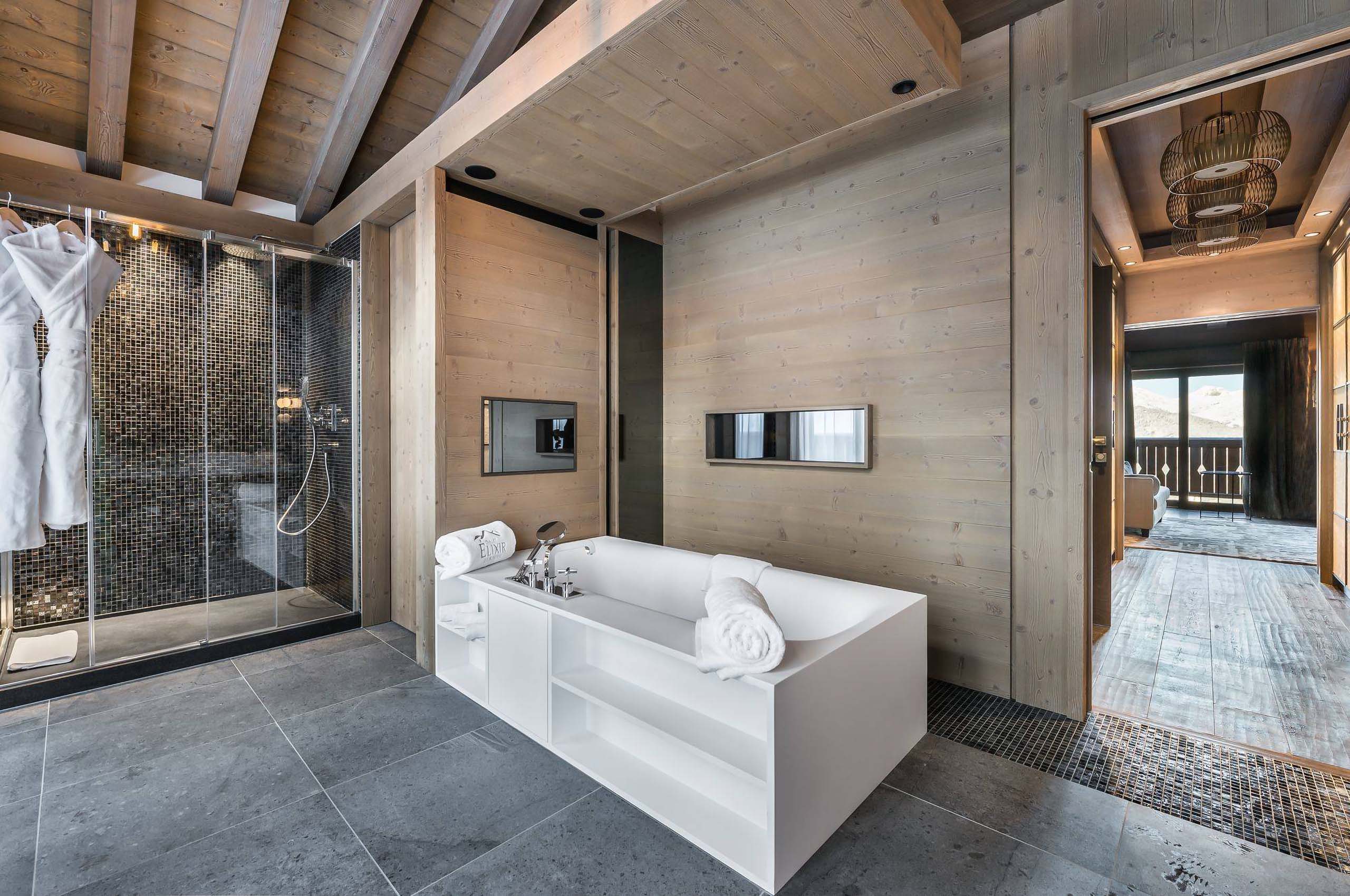 bathroom-bathtub-shower-modern-spacious-design-courchevel1850-luxury-chalet-alexi