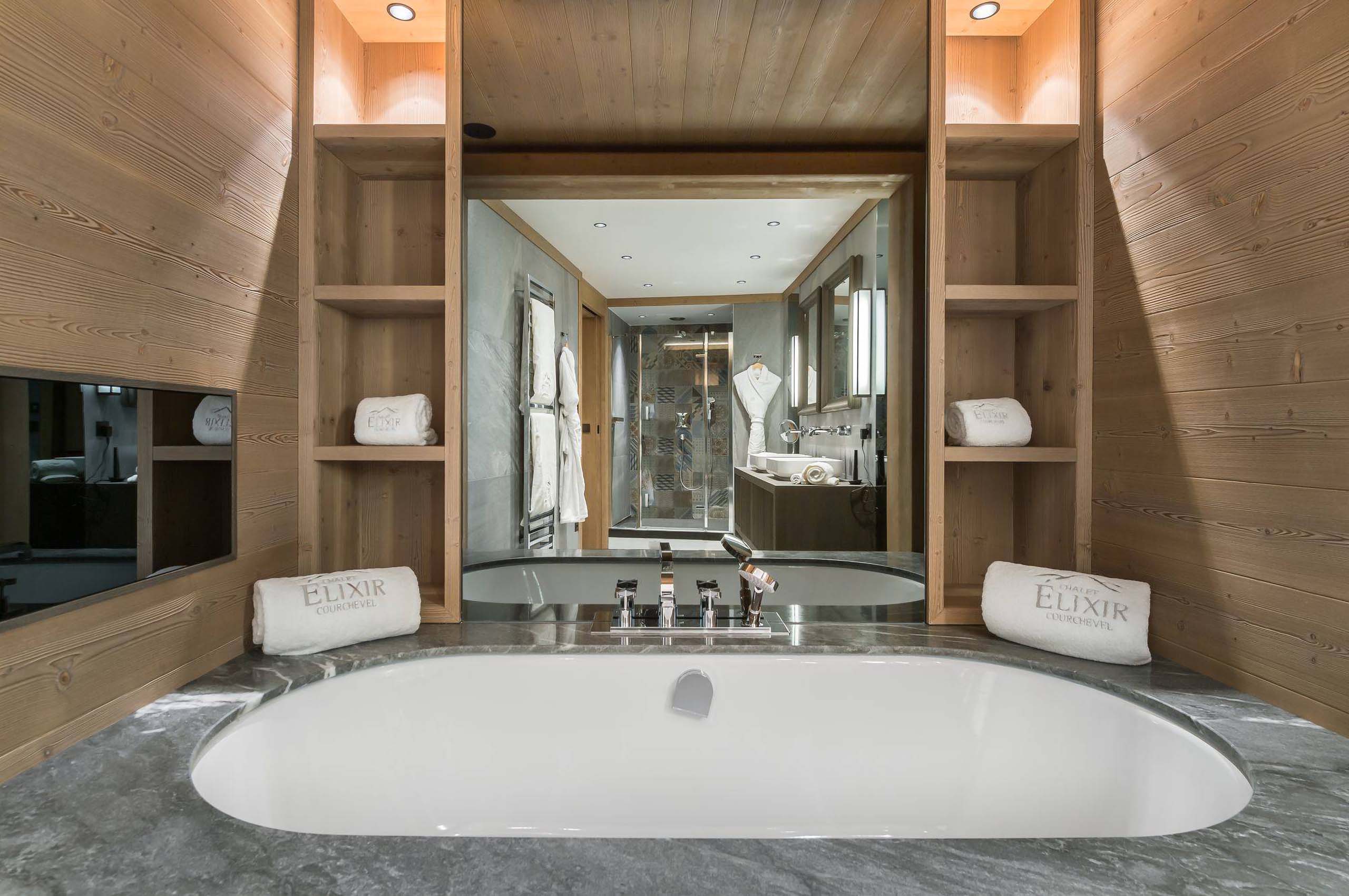 bathtub-bathroom-tv-modern-elegant-design-courchevel1850-luxury-chalet-alexi