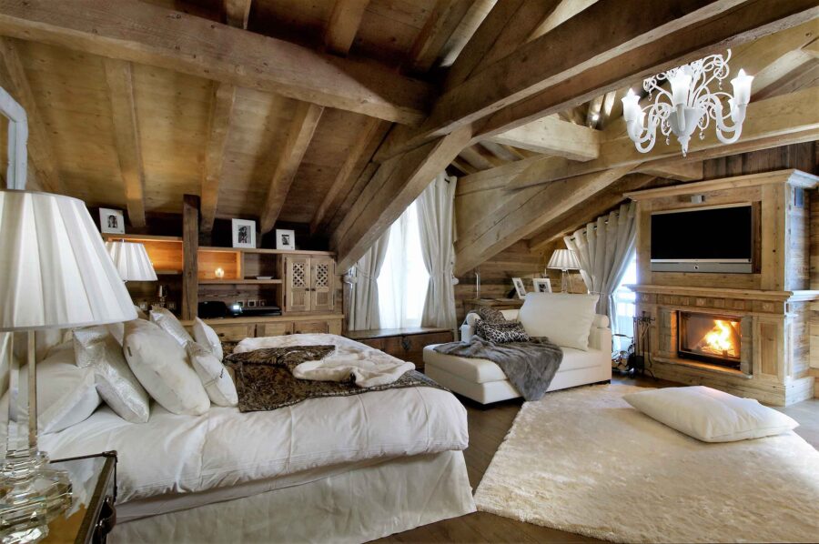 bedroom-fireplace-cosy-alpine-elegant-design-courchevel1850-luxury-chalet-rochel