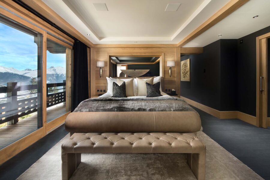 bedroom-mountainviews-balcony-elegant-modern-design-courchevel1850-luxury-chalet-palais