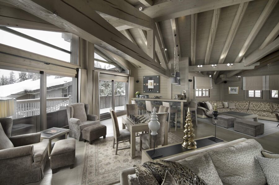 chalet-abbie-livingroom-gamesroom-bar-hosting-entertainment-balcony-mountainview-sleek-elegant-interior-design-luxury-rental-retreat-courchevel1850