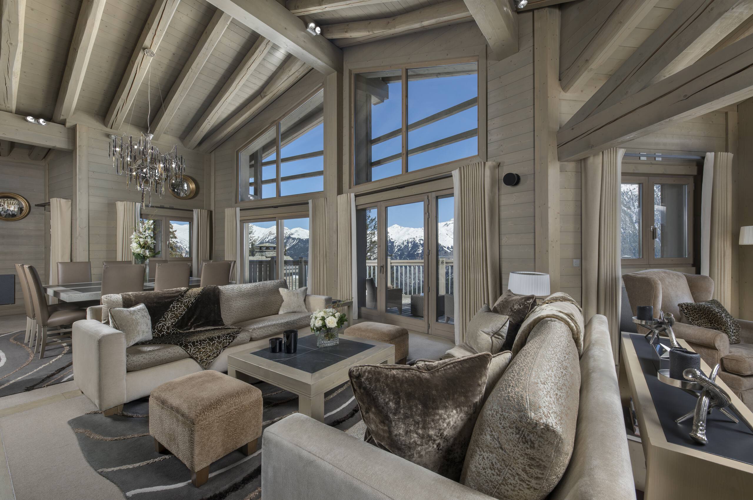 chalet-abbie-mainpage-livingroom-mountainview-spacious-bright-modern-interior-design-luxury-rental-retreat-courchevel1850