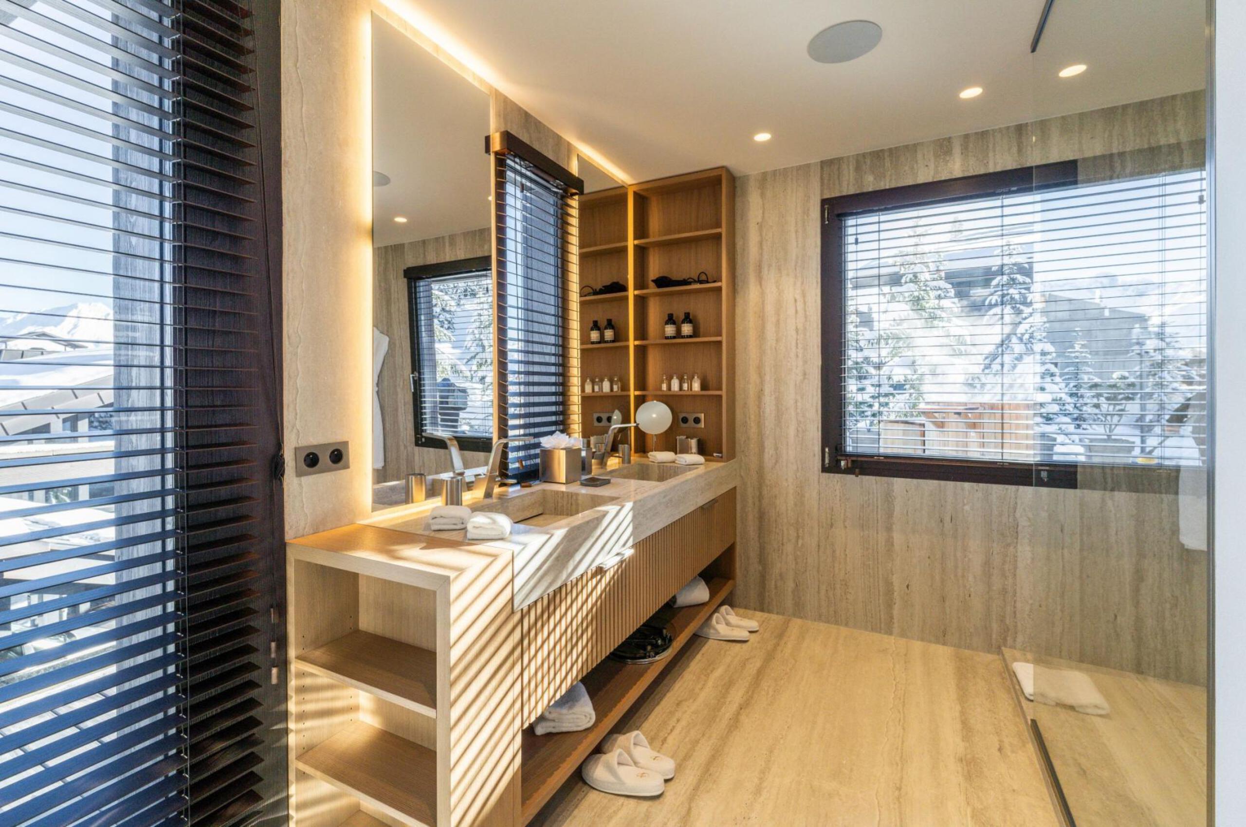 chalet-bleu-bathroom-doublesink-modern-bright-scenic-views-stylish-luxury-alpine-rental-retreat-courchevel1850