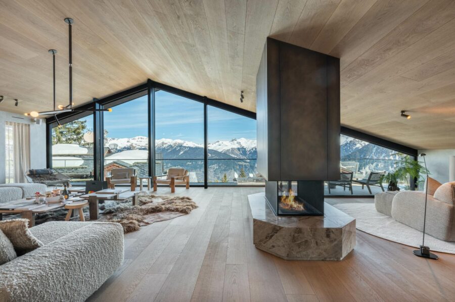 chalet-breeze-livingroom-openplan-mountainview-fireplace-modern-stylish-luxury-interior-courchevel1850