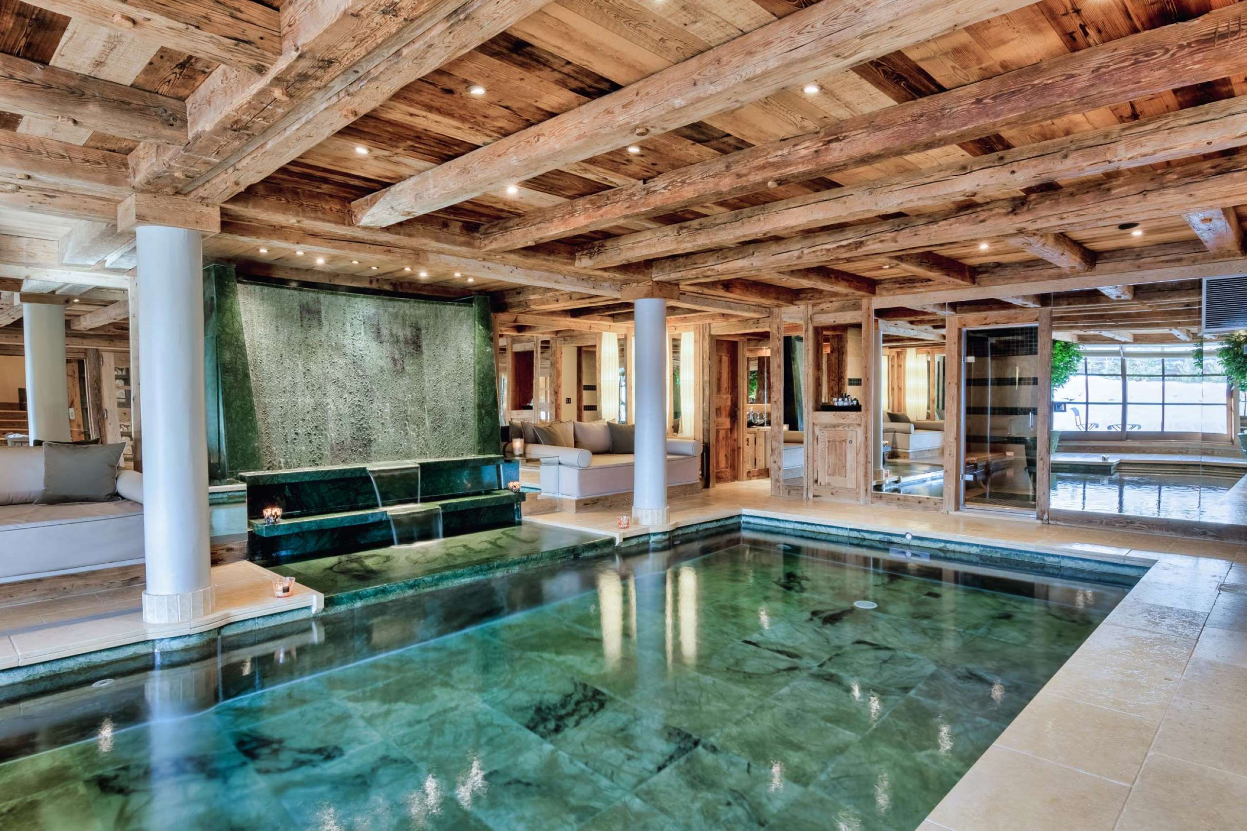 chalet-charlotte-indoor-swimmingpool-spa-wellness-relaxation-serene-alpine-interiors-luxury-courchevel1850