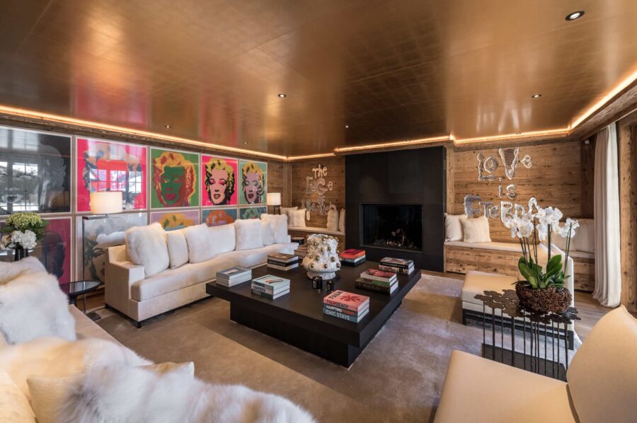 chalet-collette-livingroom-bespoke-artwork-unique-modern-luxury-interiordesign-fireplace-gstaad