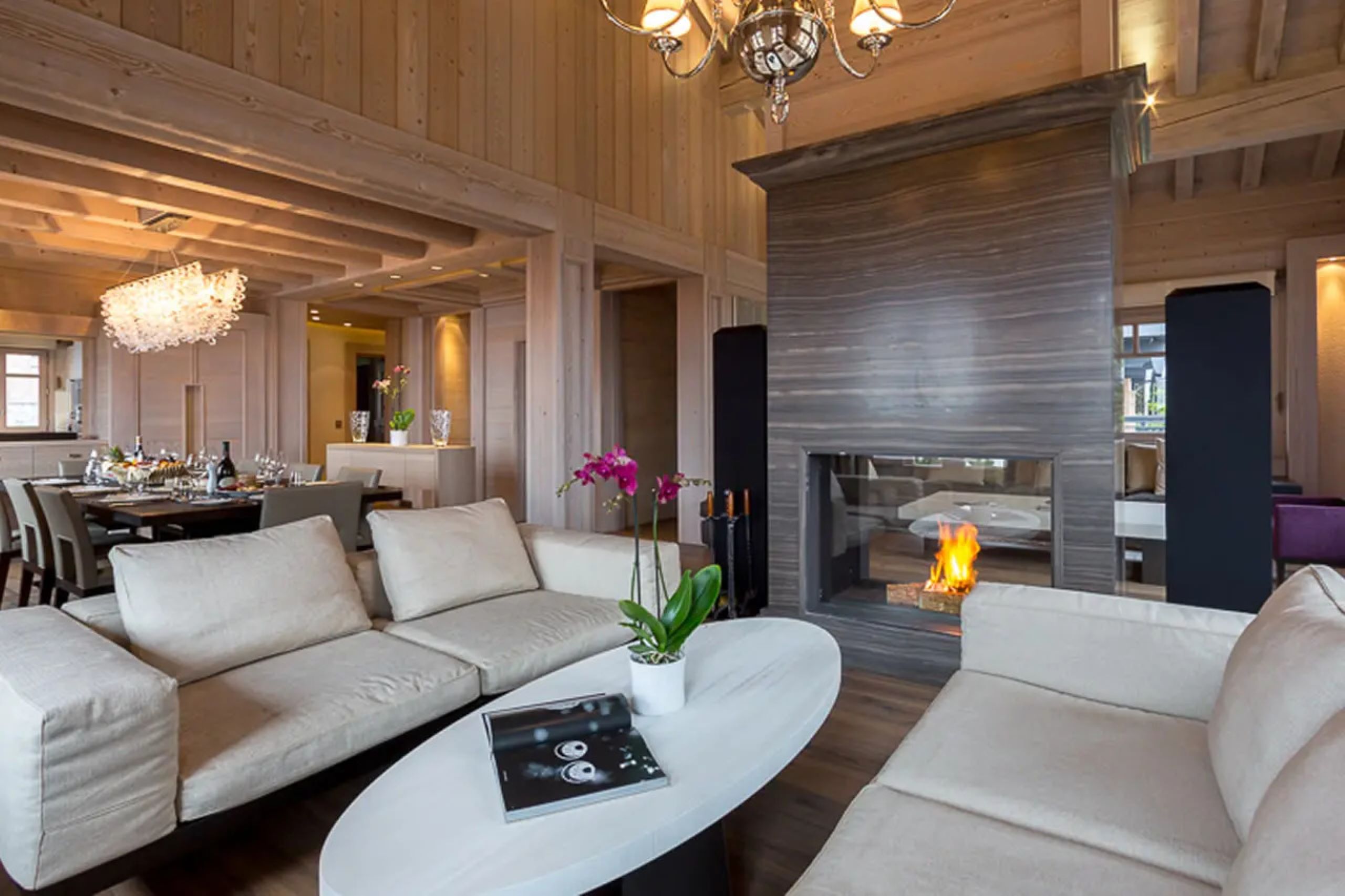 chalet-elodie-livingroom-fireplace-openplan-modern-alpine-luxury-courchevel1850