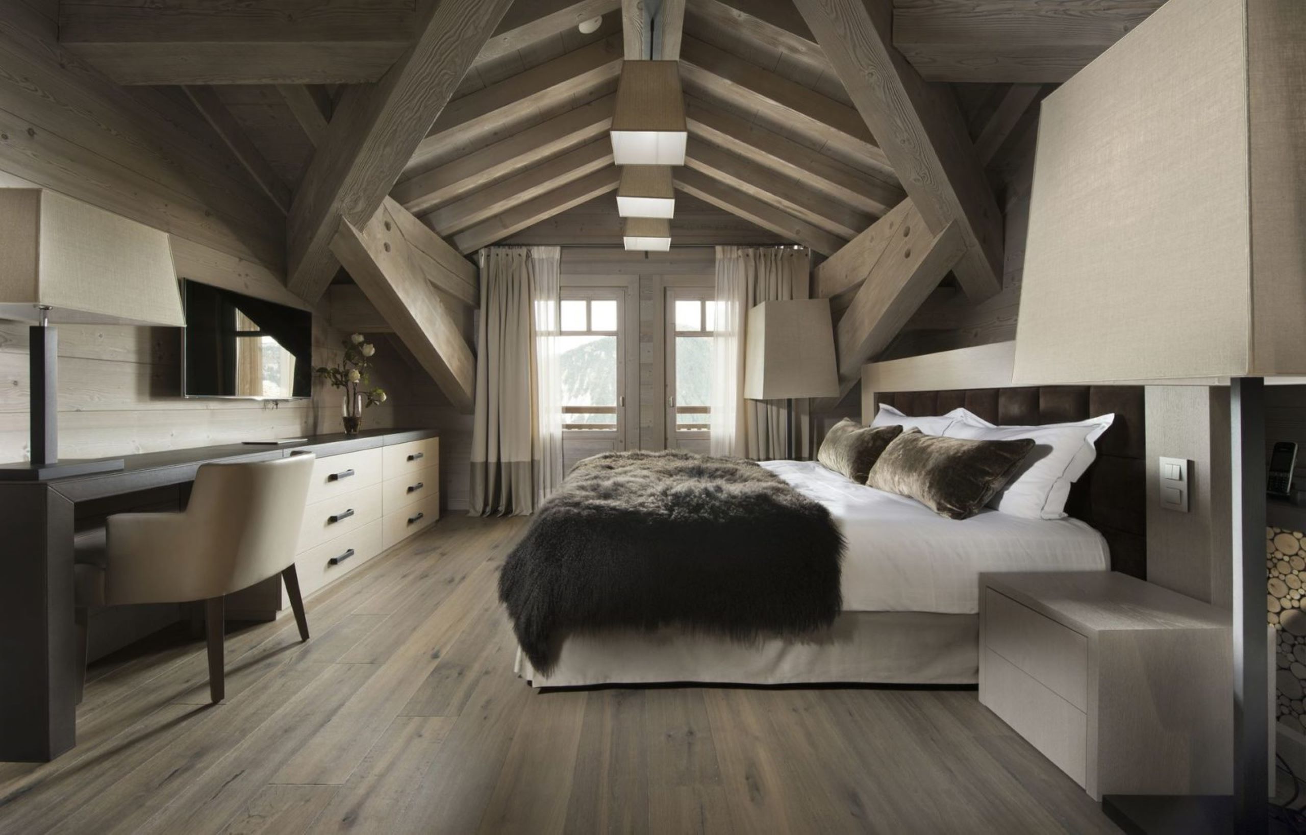 chalet-elodie-mainpage-bedroom-spacious-elegant-mountainview-luxury-modern-alpine-interiordesign-courchevel1850