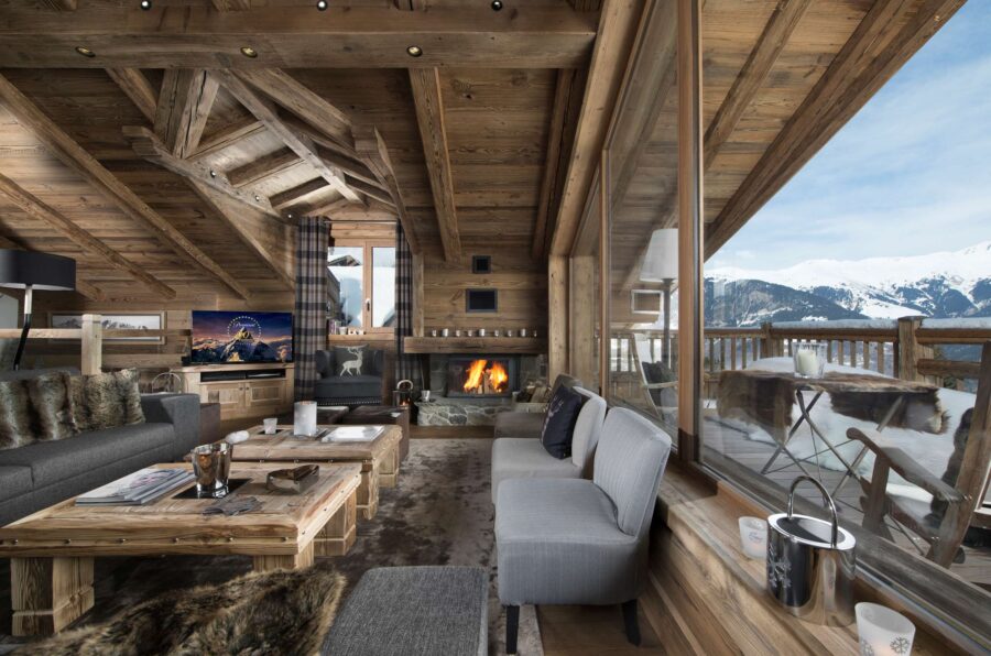 chalet-magali-livingroom-terrace-fireplace-mountain-views-luxury-alpine-retreat-courchevel1550