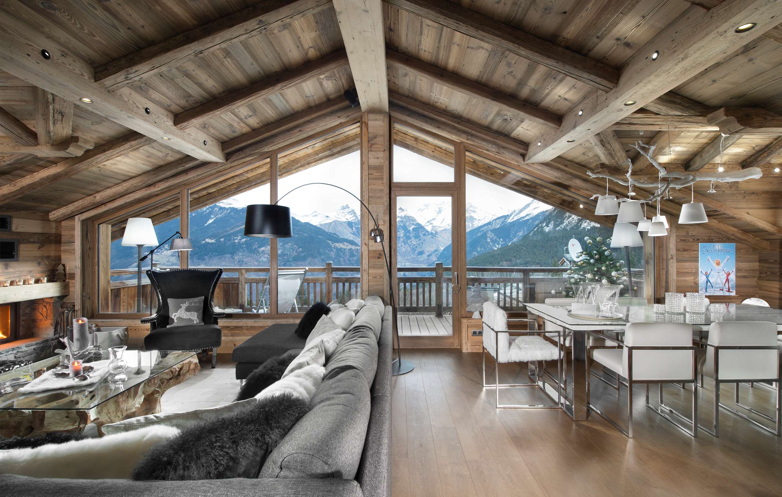 chalet-maya-mainpage-living-room-lounge-dining-balcony-mountain-views-fireplace-luxury-alpine-interiors-courchevel1550