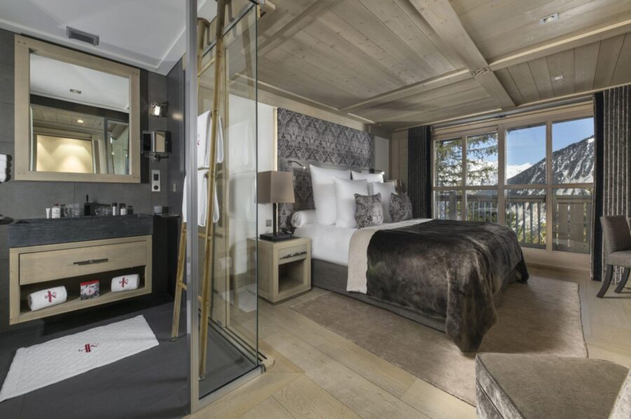 chalet-olympe-bedroom-mountainview-ensuite-bathroom-modern-sleek-alpine-design-luxury-interior-courchevel