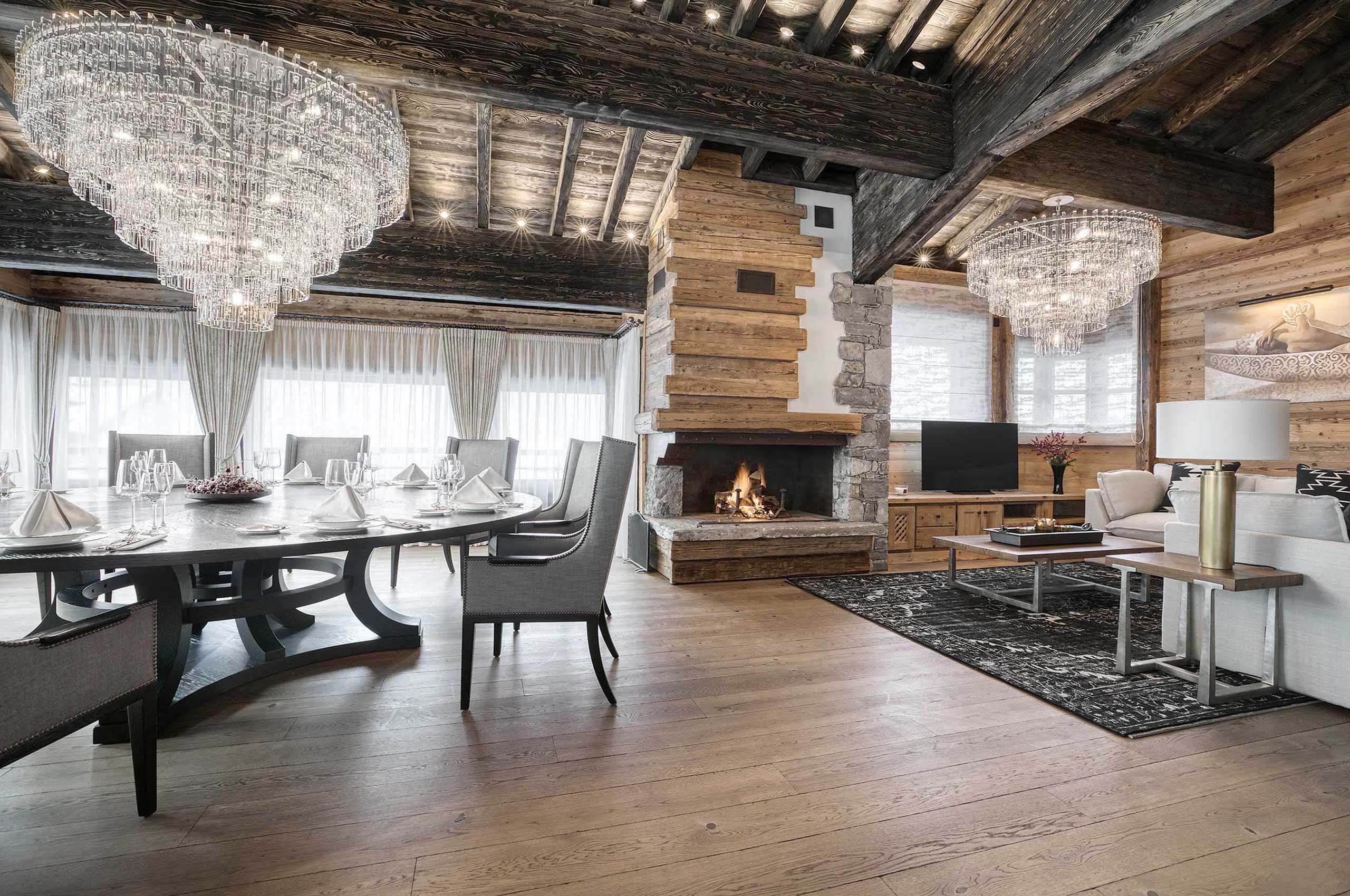 chalet-pearl-livingspace-openplan-diningroom-livingroom-fireplace-alpine-luxury-design-courchevel-1850