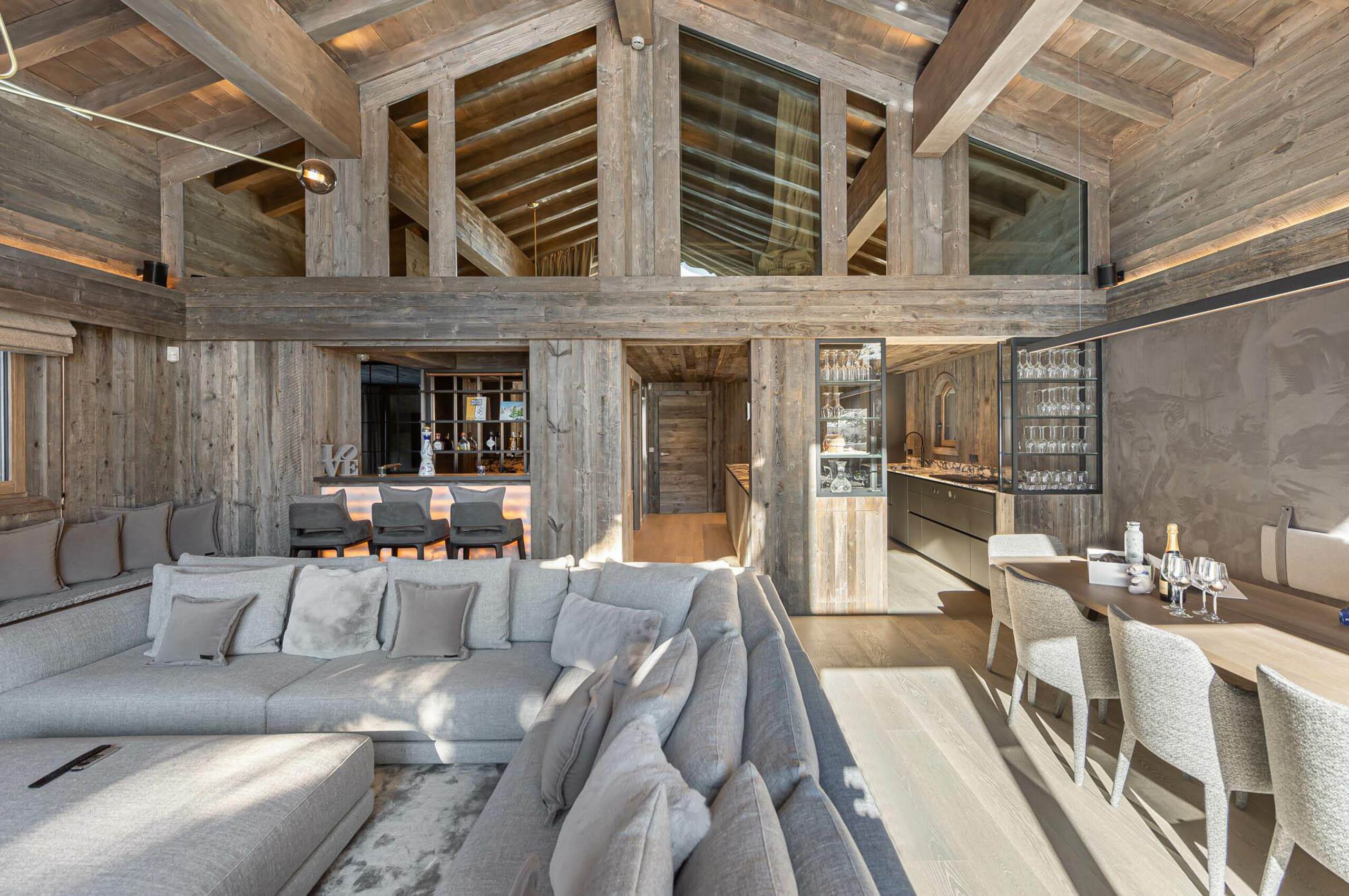 chalet-rosa-livingroom-diningroom-kitchen-openplan-modern-luxury-alpine-interiordesign-courchevel1850