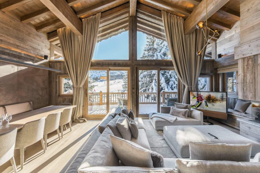 chalet-rosa-mainpage-livingspace-openplan-luxury-interiordesign-mountainview-courchevel1850