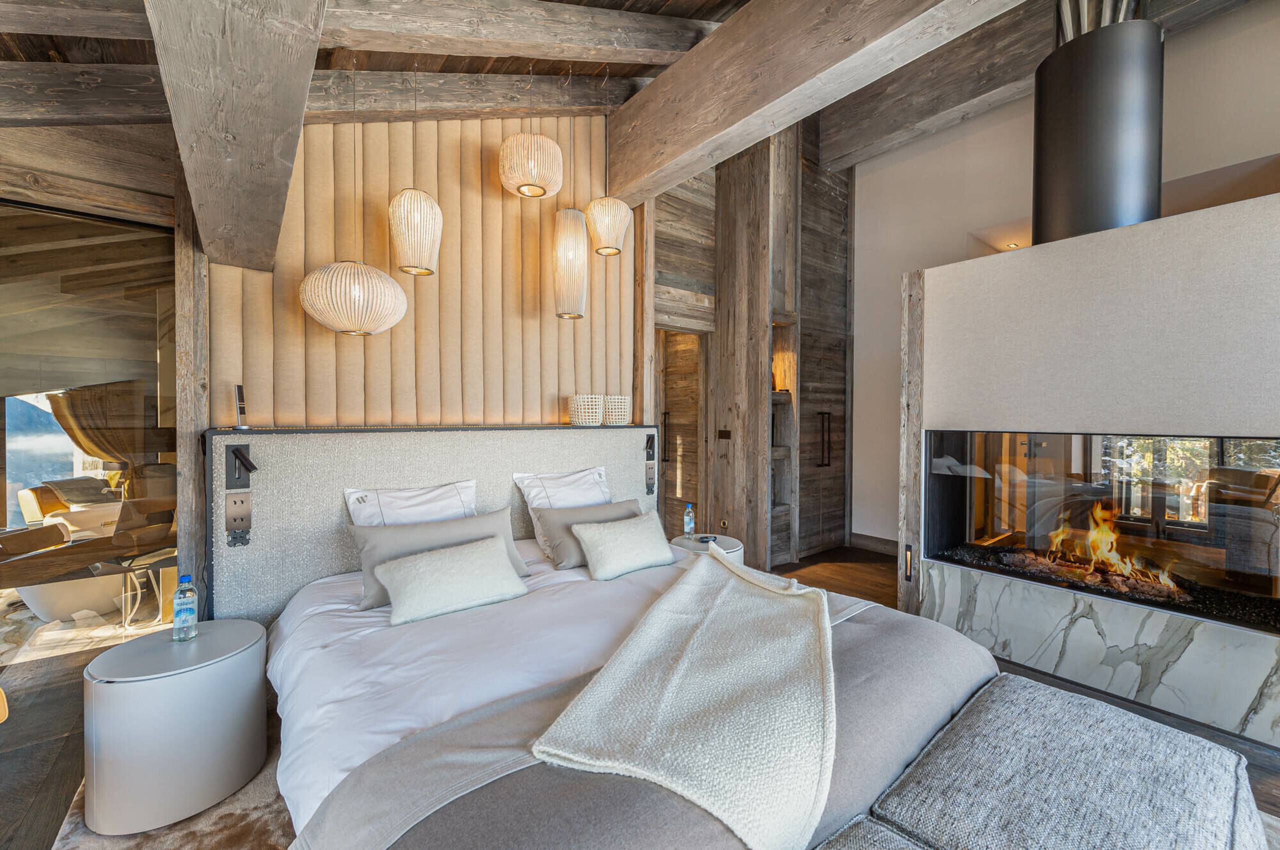 chalet-wintrelle-bedroom-fireplace-spacious-elegant-stylish-design-luxury-alpine-retreat-courchevel1550