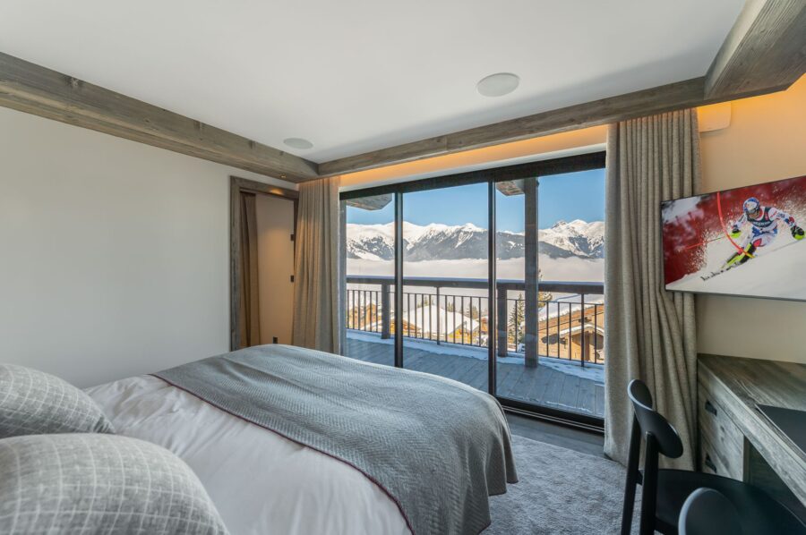 chalet-wintrelle-bedroom-mountainview-balcony-sleek-modern-alpine-interior-luxury-rental-courchevel1550