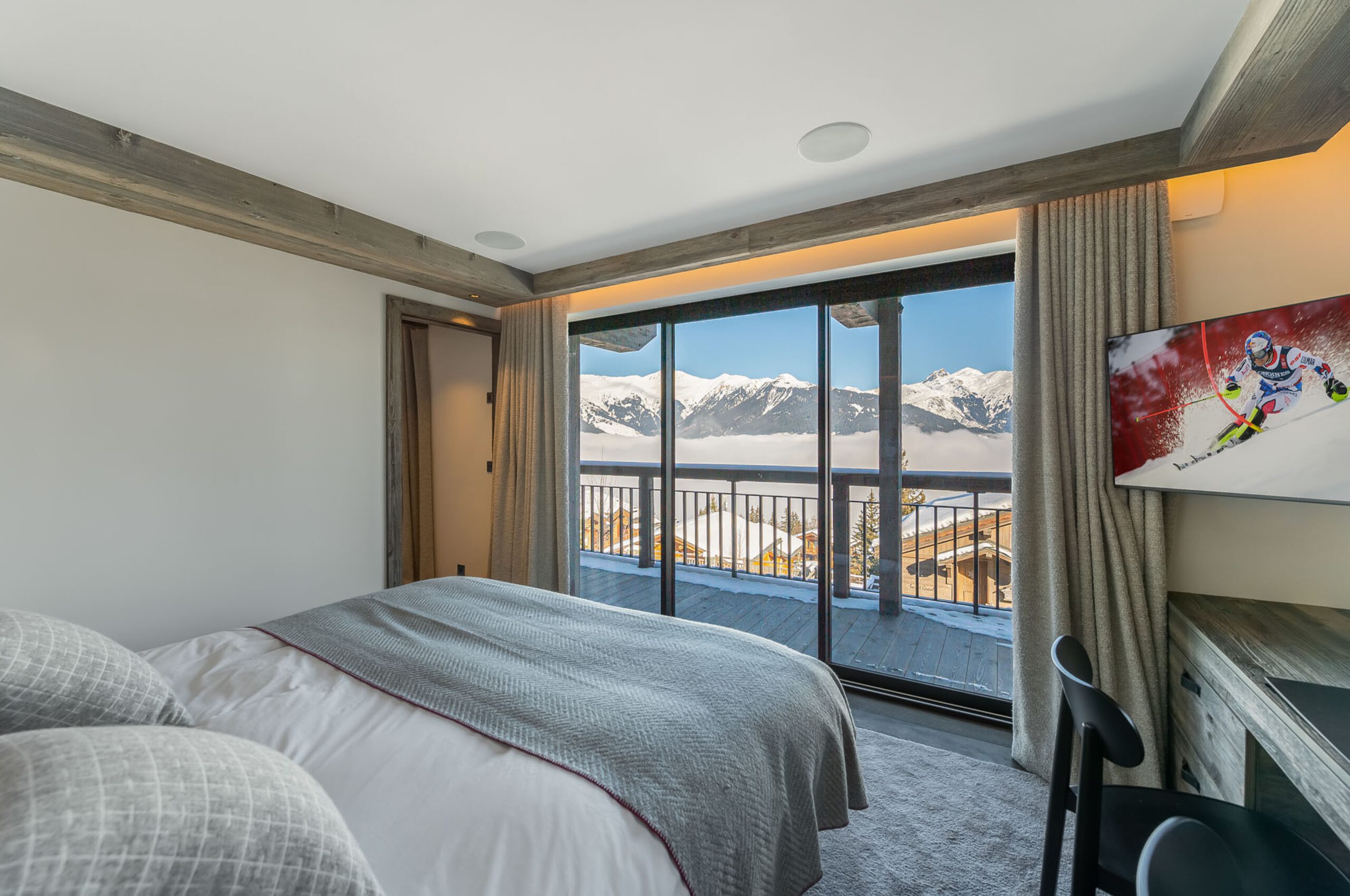 chalet-wintrelle-bedroom-mountainview-balcony-sleek-modern-alpine-interior-luxury-rental-courchevel1550