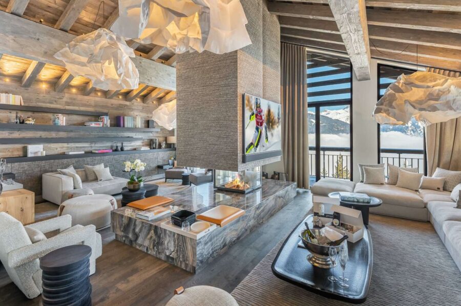 chalet-wintrelle-mainpage-livingroom-openplan-fireplace-mountainviews-bespoke-modern-elegant-luxury-design-courchevel1550