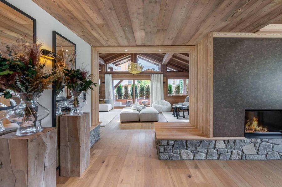chalet-wynn-livingspace-fireplace-hallway-modern-alpine-luxury-megeve