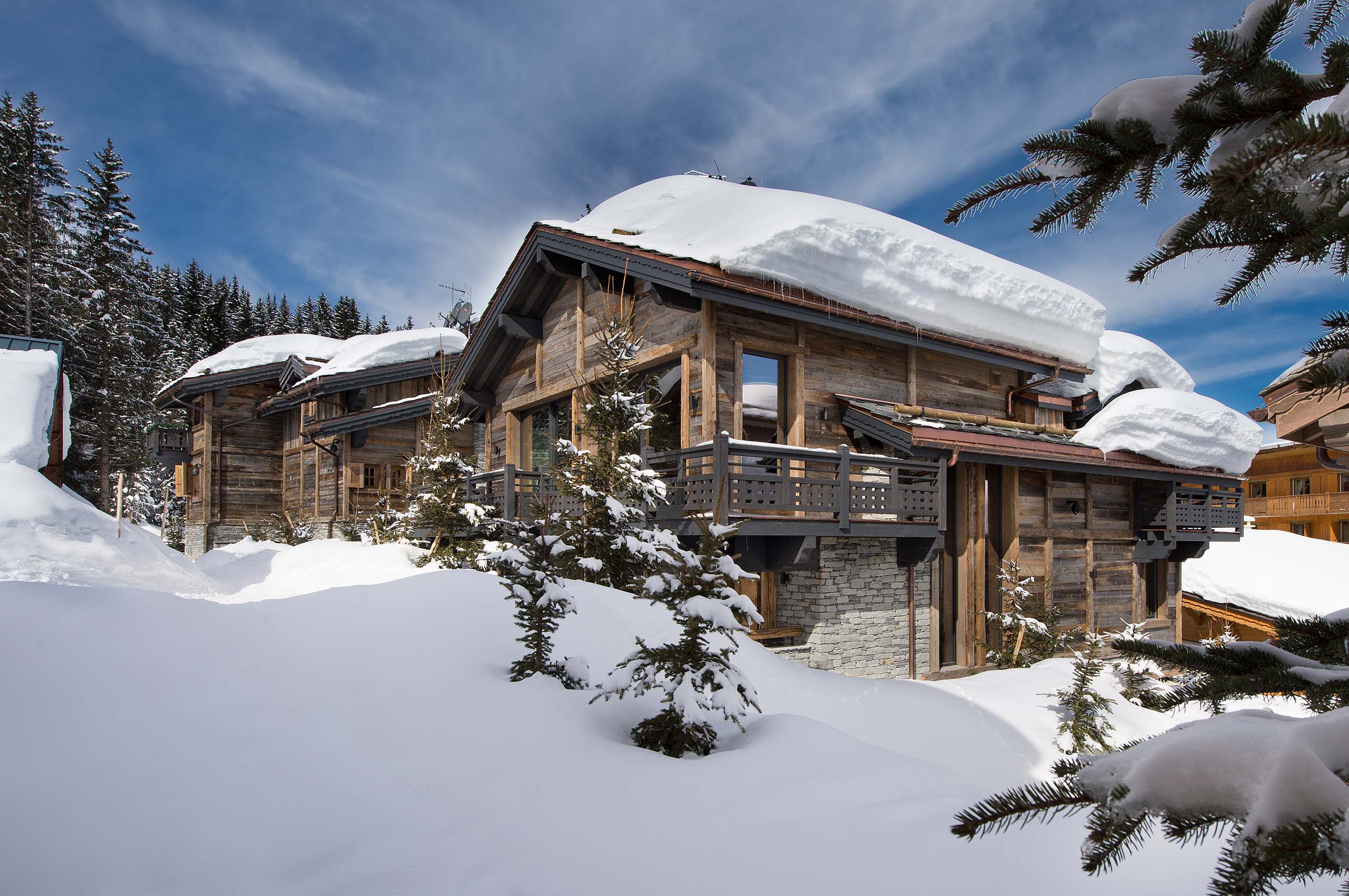 exterior-daytime-snowcovered-luxury-rental-retreat-courchevel1850-chalet-palais