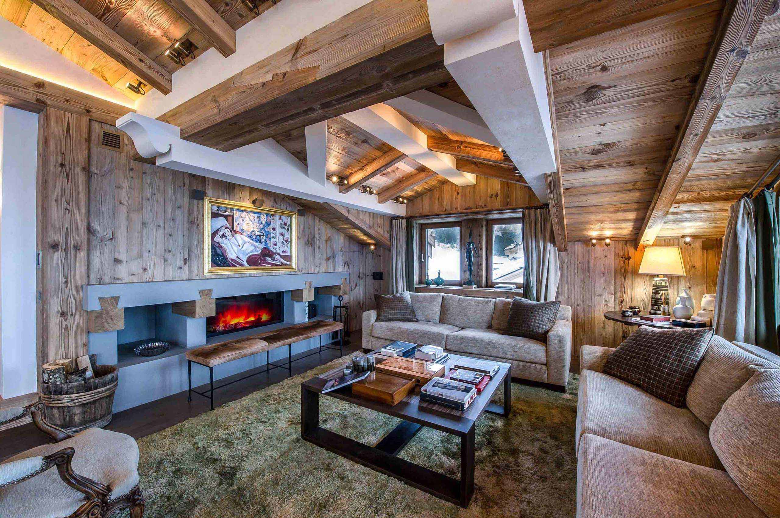 livingroom-fireplace-cosy-alpine-interior-courchevel1850-luxury-chalet-brielle