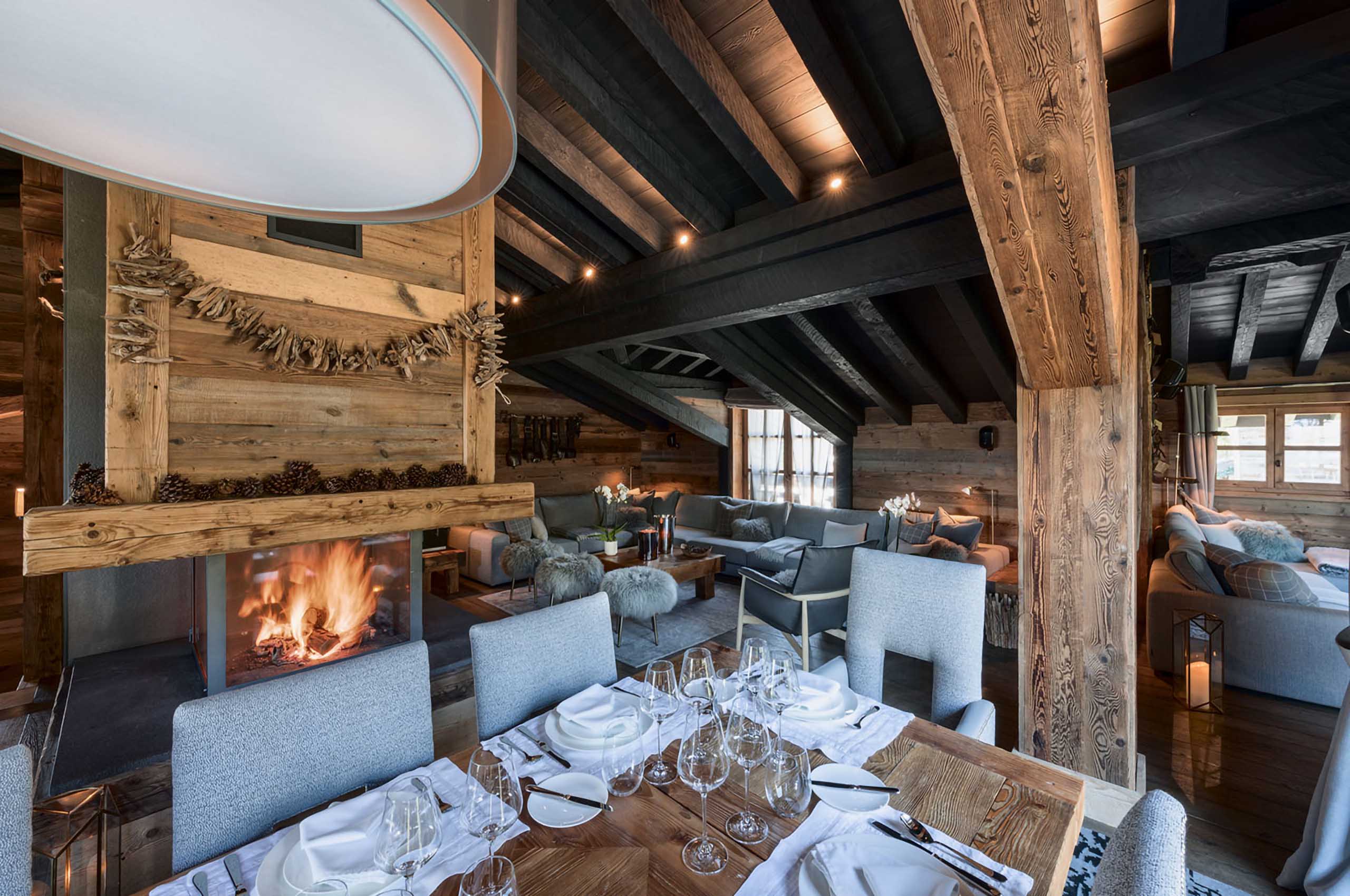 livingroom-openplan-fireplace-courchevel1850-luxury-chalet-chateau