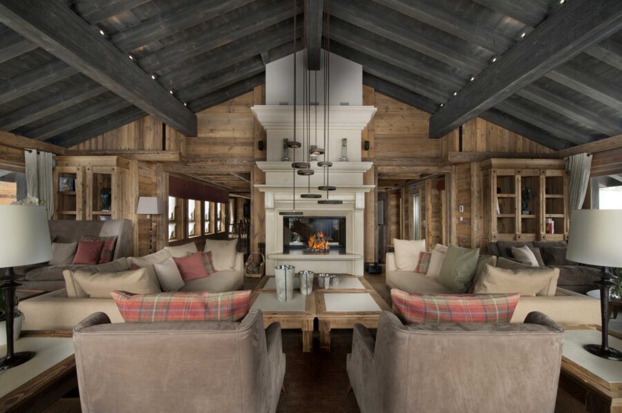 livingroom-openplan-fireplace-elegant-alpine-interiordesign-courchevel1850-luxury-chalet-edel