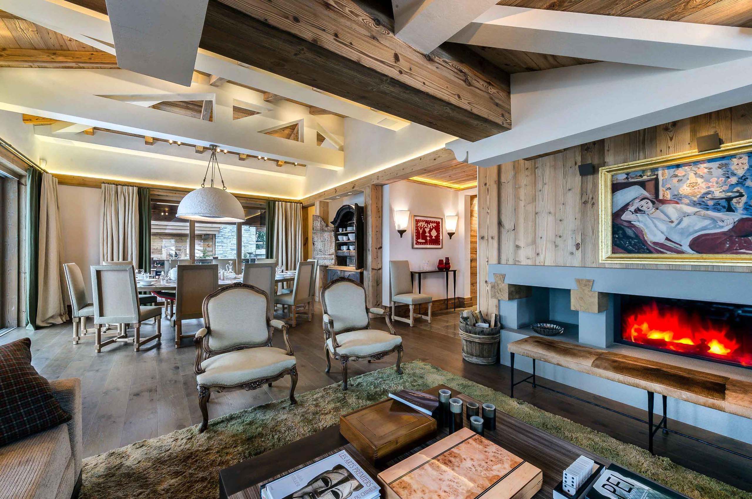 livingspace-lounge-diningroom-fireplace-cosy-alpine-design-courchevel1850-luxury-chalet-brielle