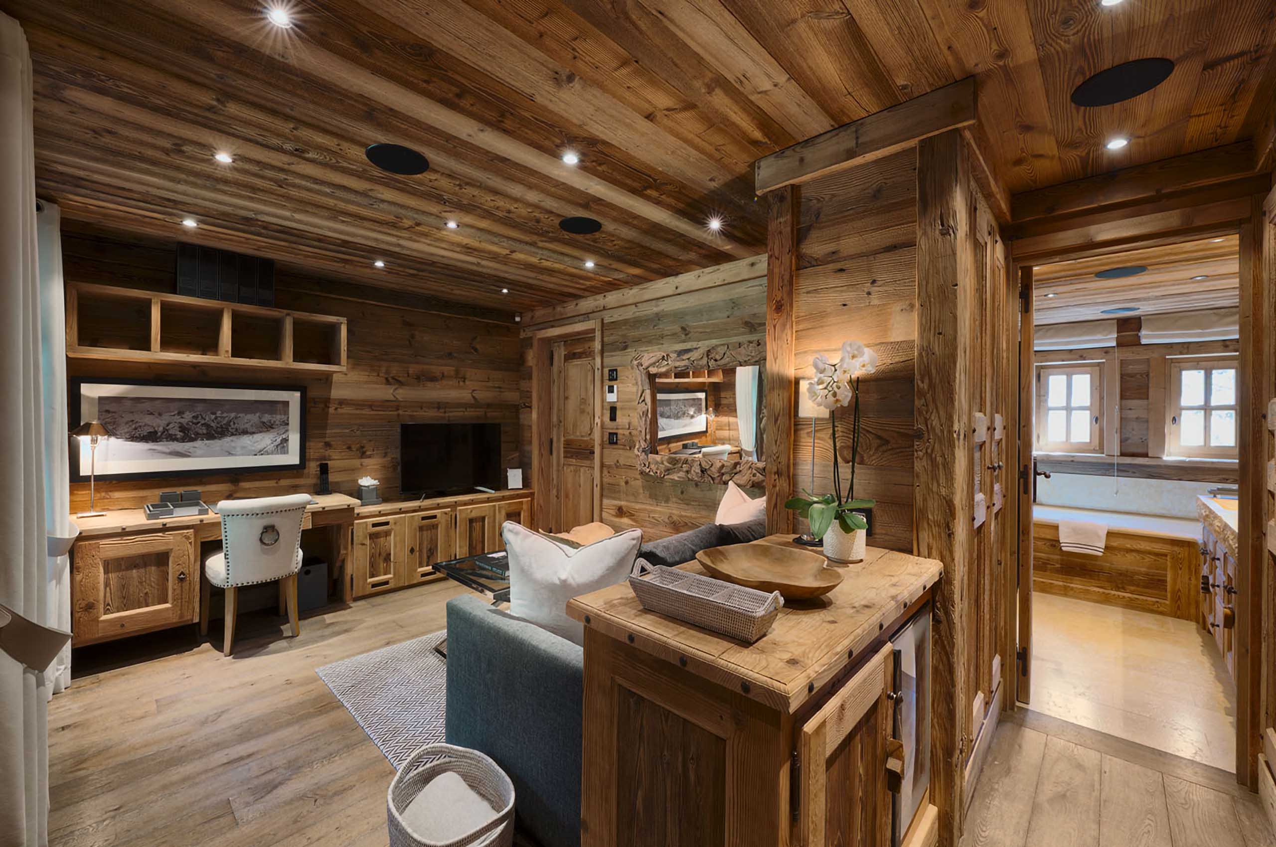 loungearea-office-tvroom-ensuite-courchevel1850-luxury-chalet-chateau