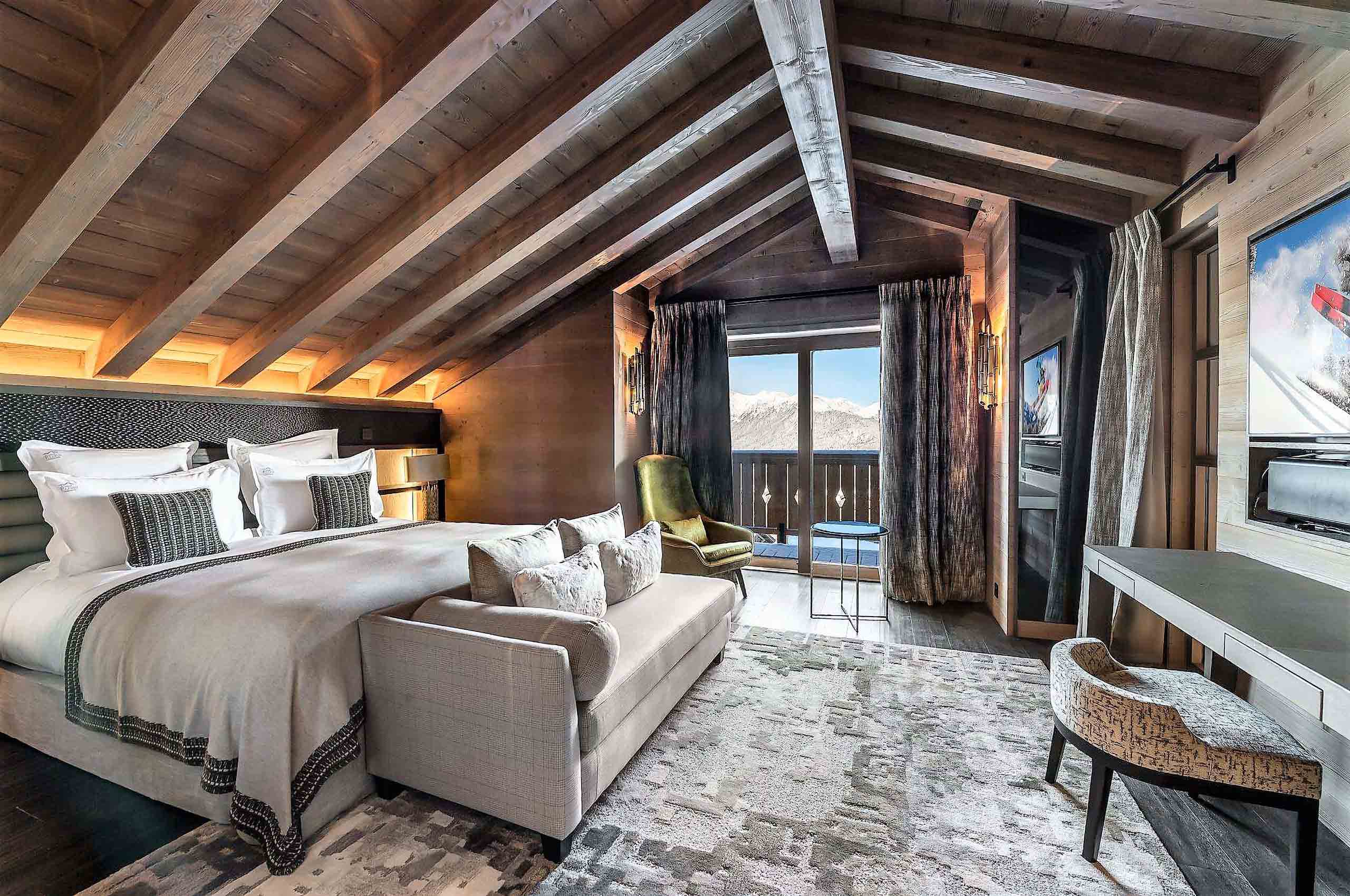 mainpage-bedroom-mountainview-luxury-elegant-interior-courchevel1850-chalet-alexi