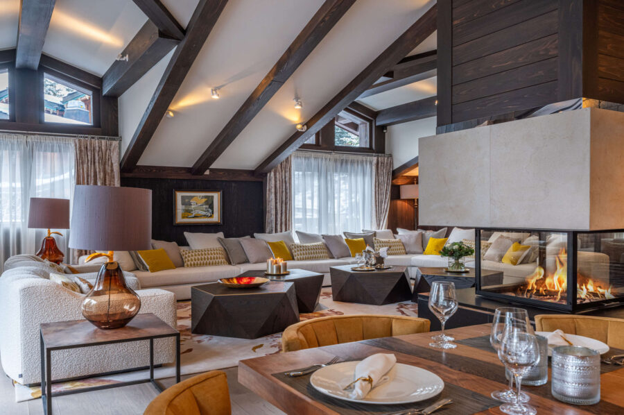 mainpage-livingroom-lounge-fireplace-openplan-elegant-luxury-modern-interiordesign-courchevel1850-chalet-corinne