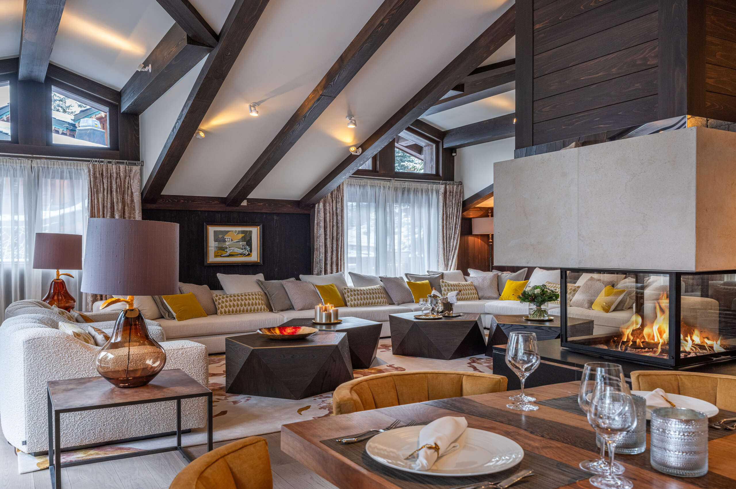 mainpage-livingroom-lounge-fireplace-openplan-elegant-luxury-modern-interiordesign-courchevel1850-chalet-corinne