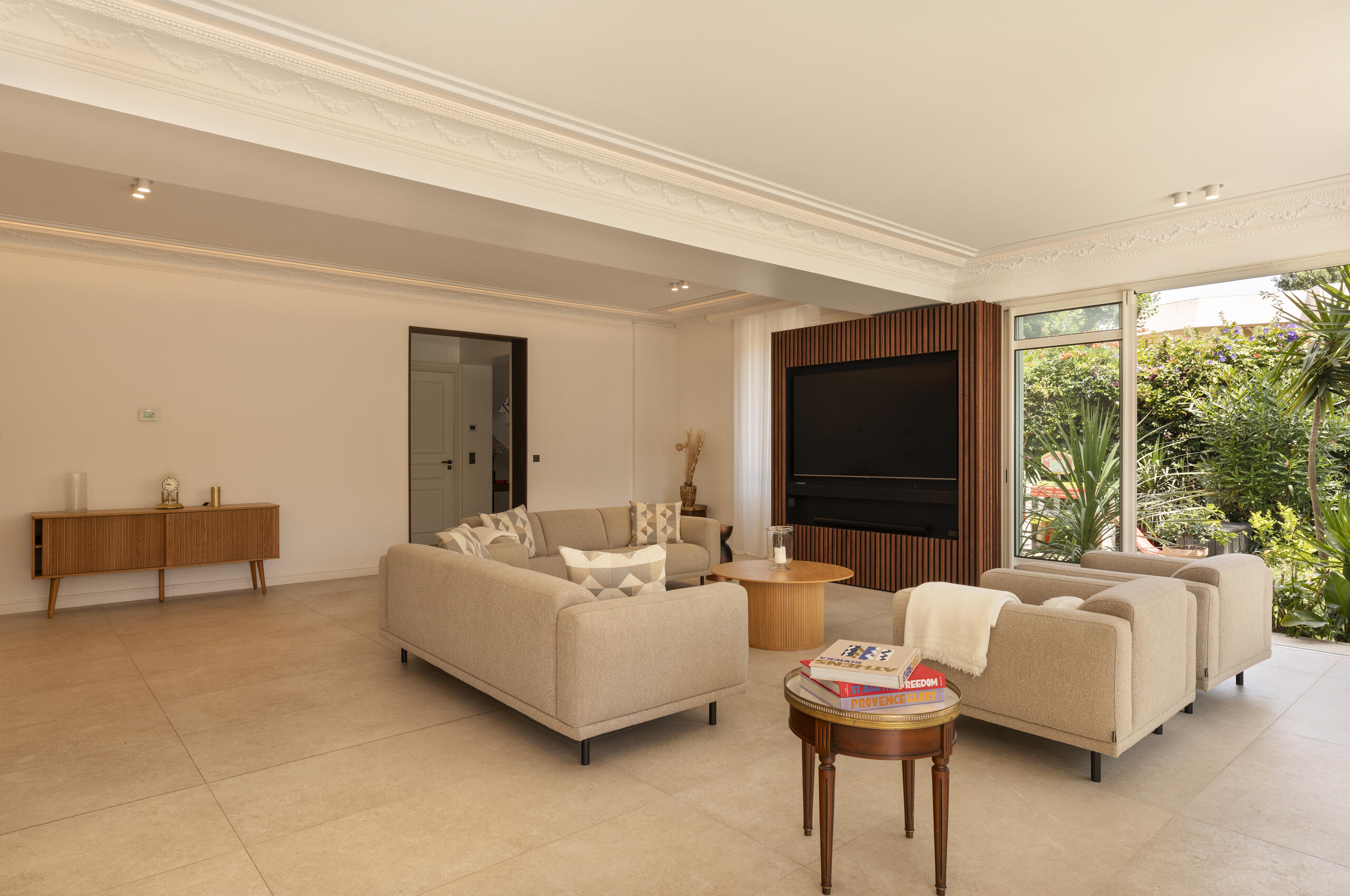 villa-caliretta-livingroom-tvroom-lounge-modern-luxury-gardenviews-cannes