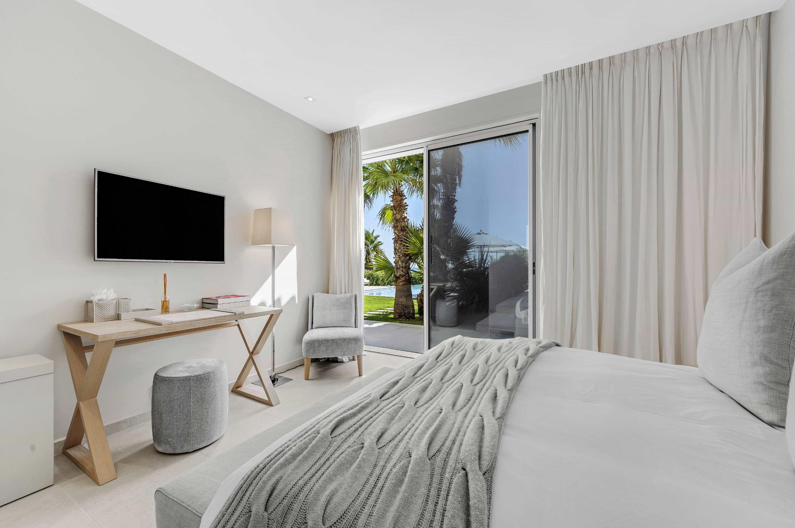 villa-carol-bedroom-swimming-pool-view-serene-design-luxury-ramatuelle