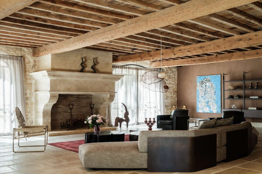 villa-cas-livingroom-lounge-grand-fireplace-unique-artwork-charming-chic-design-luxury-provence