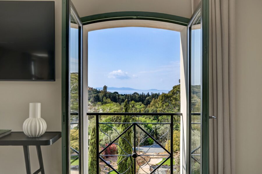 villa-cassie-seaview-bedroom-window-tropical-garden-view-luxury-rental-retreat-lacroixvalmer