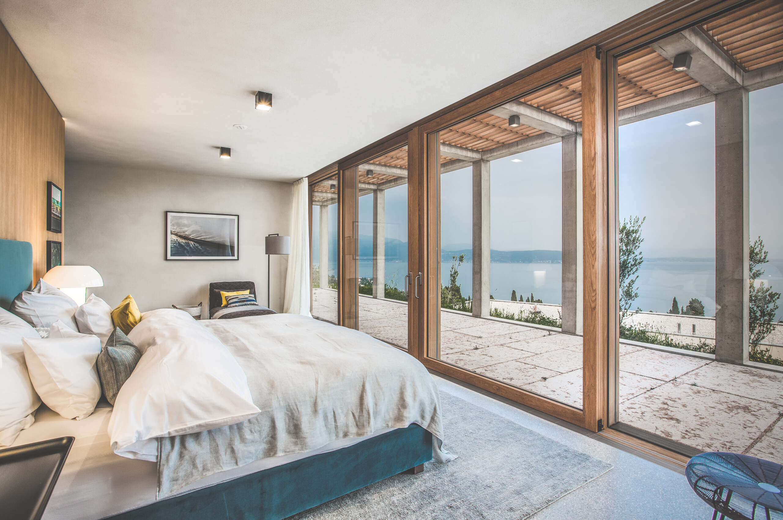 villa-karina-bedroom-balcony-scenic-view-modern-luxury-interior-lakegarda