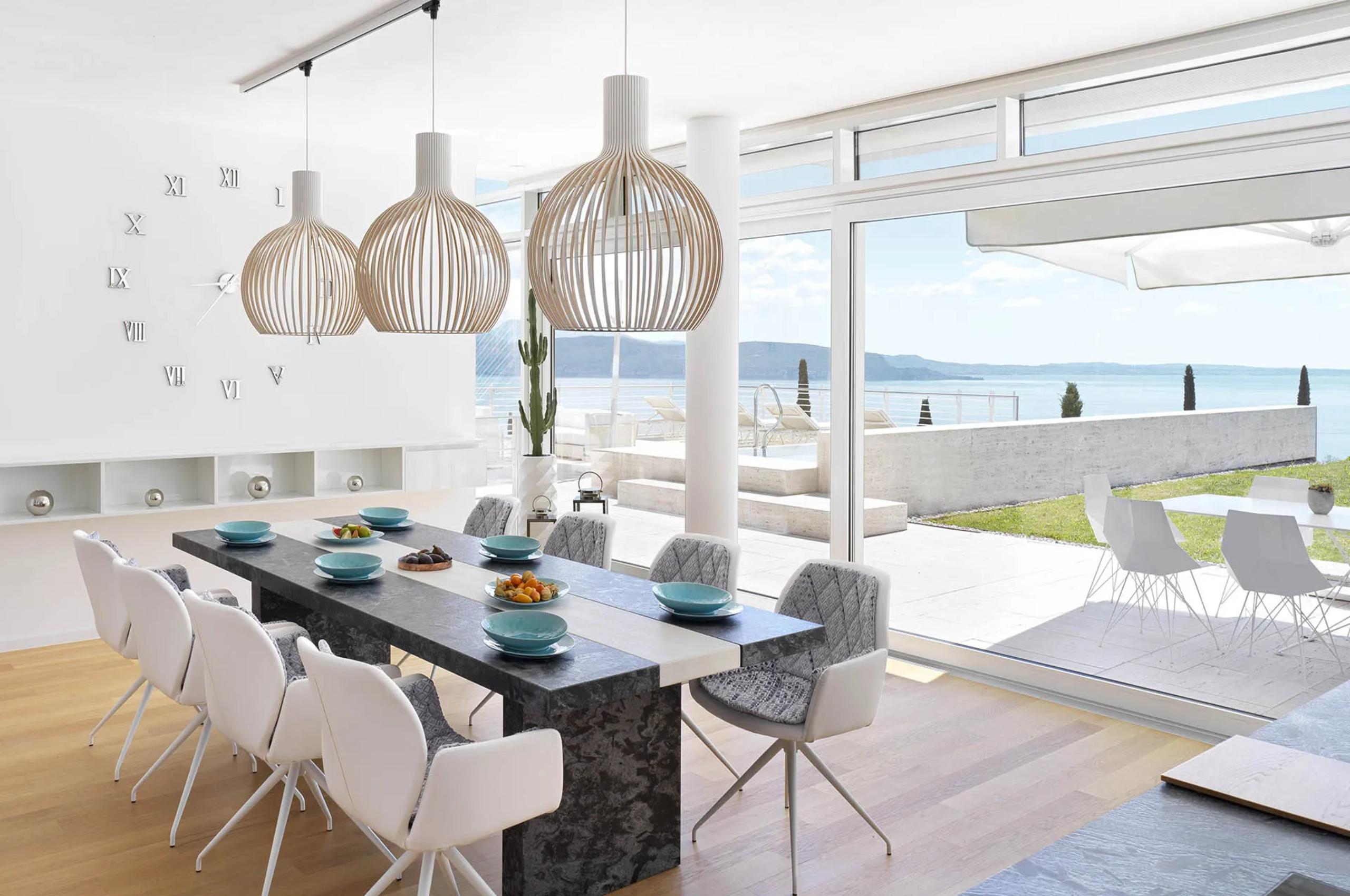 villa-magda-dining-room-scenic-lake-views-bright-modern-interiors-luxury-lakegarda