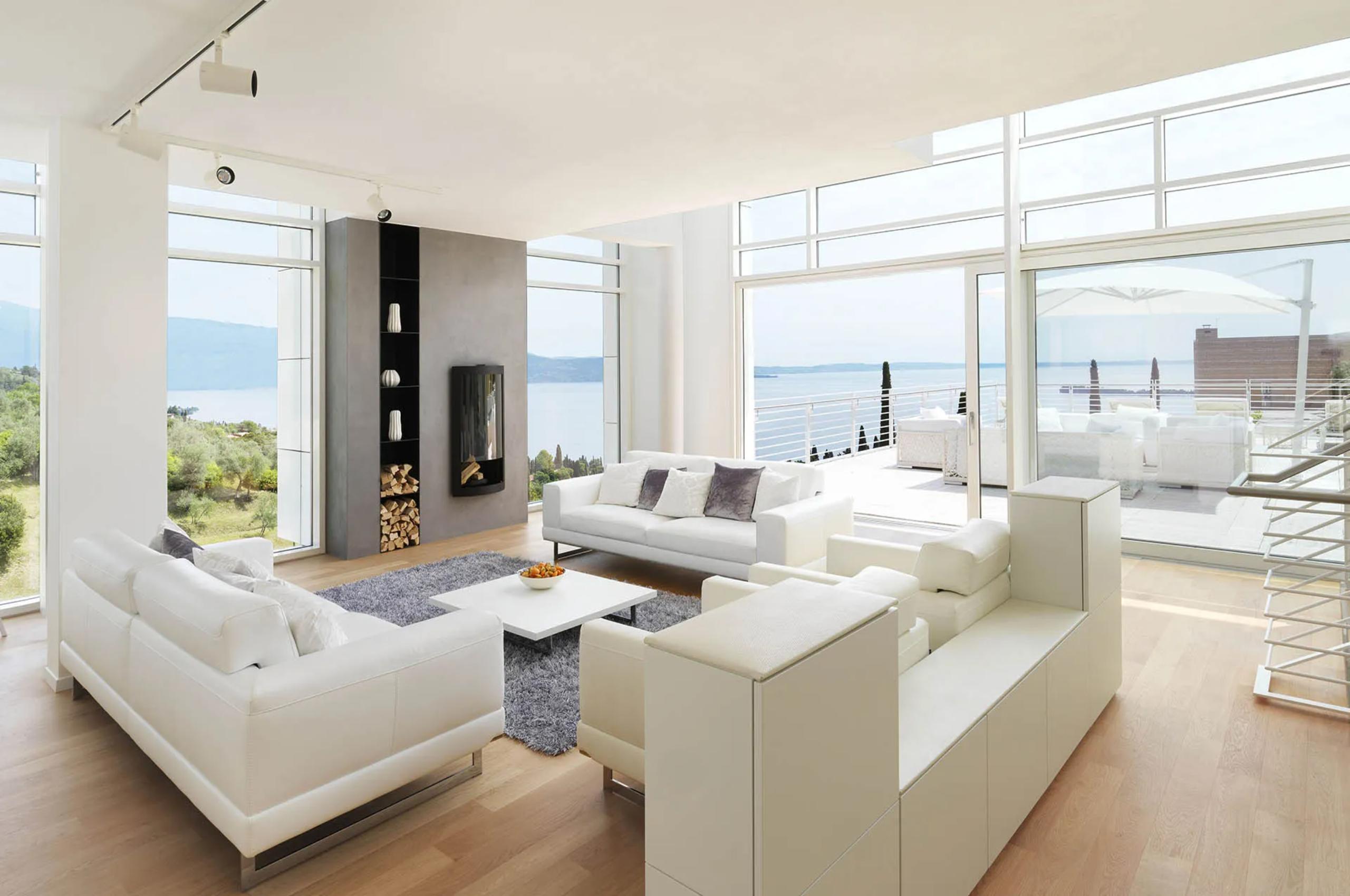villa-magda-living-room-lounge-fireplace-spacious-scenic-lake-views-bright-modern-luxury-lakegarda