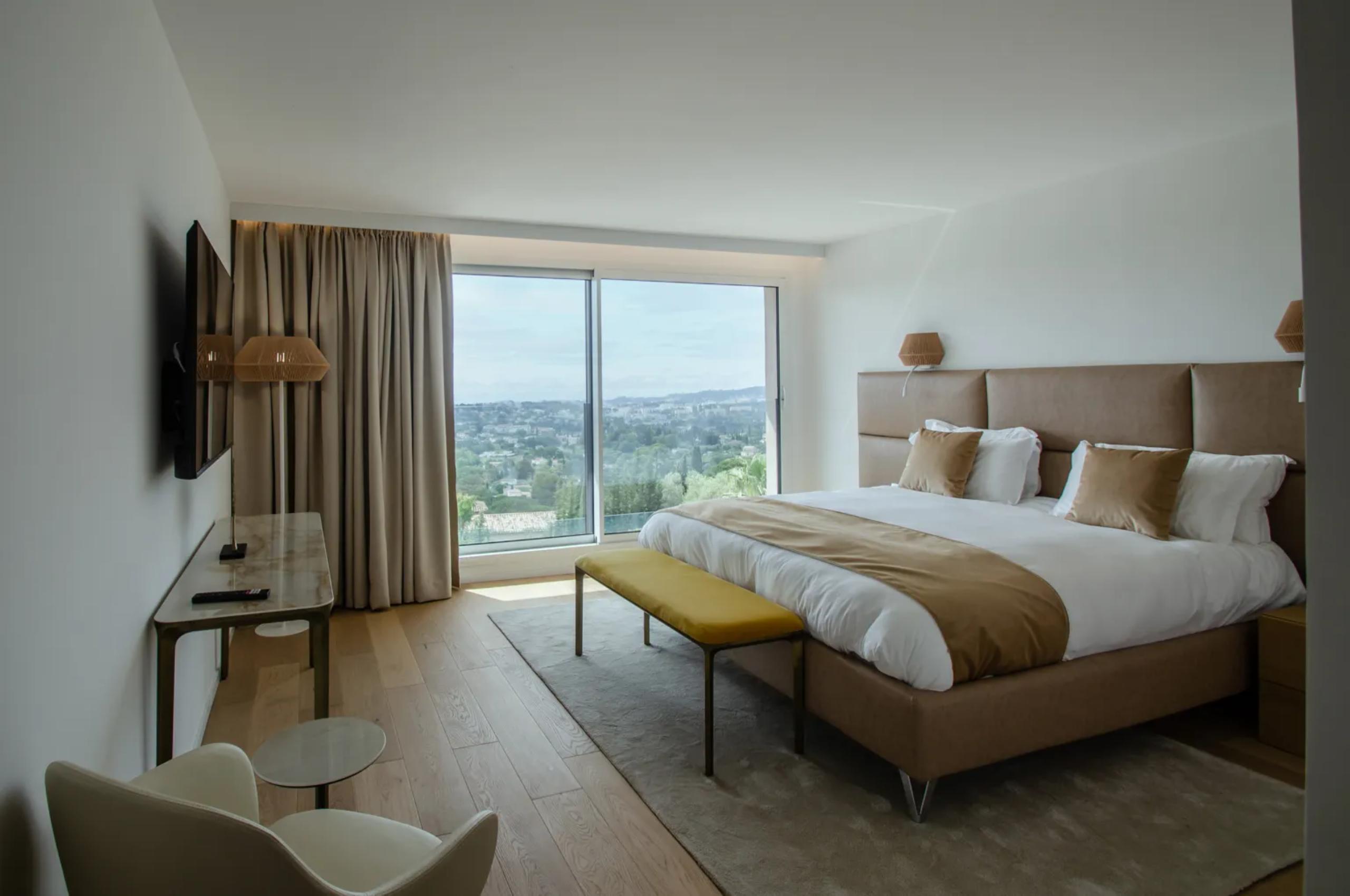 villa-mirelle-bedroom-elegant-serene-design-scenic-views-luxury-mougins