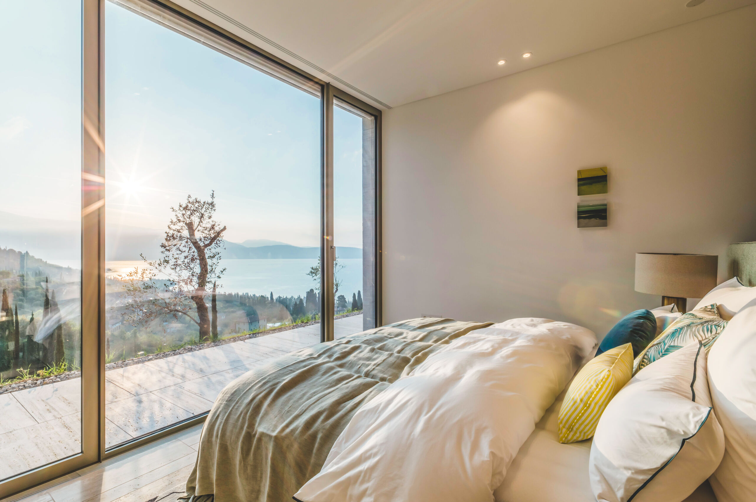 villa-noelia-bedroom-seaview-stunning-landscape-luxury-interior-lakegarda