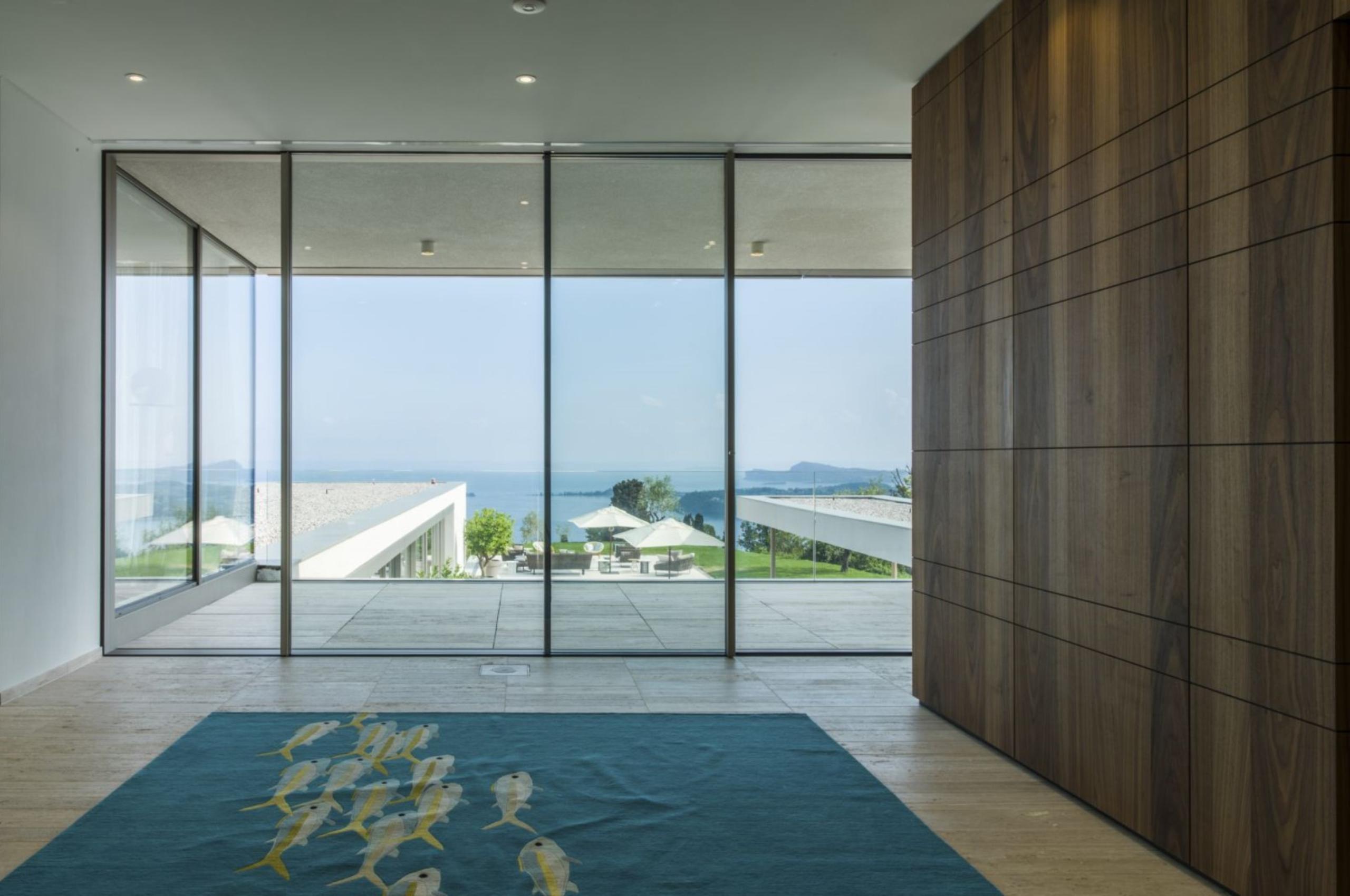 villa-noelia-hallway-entrance-bright-modern-sleek-design-lake-views-luxury-lakegarda