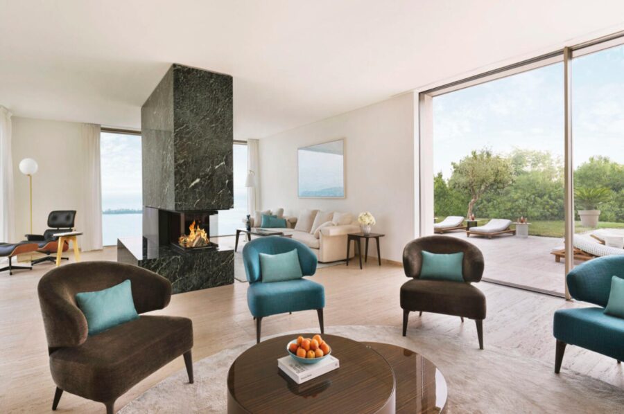 villa-noelia-living-room-fireplace-garden-lake-views-luxury-lake-garda