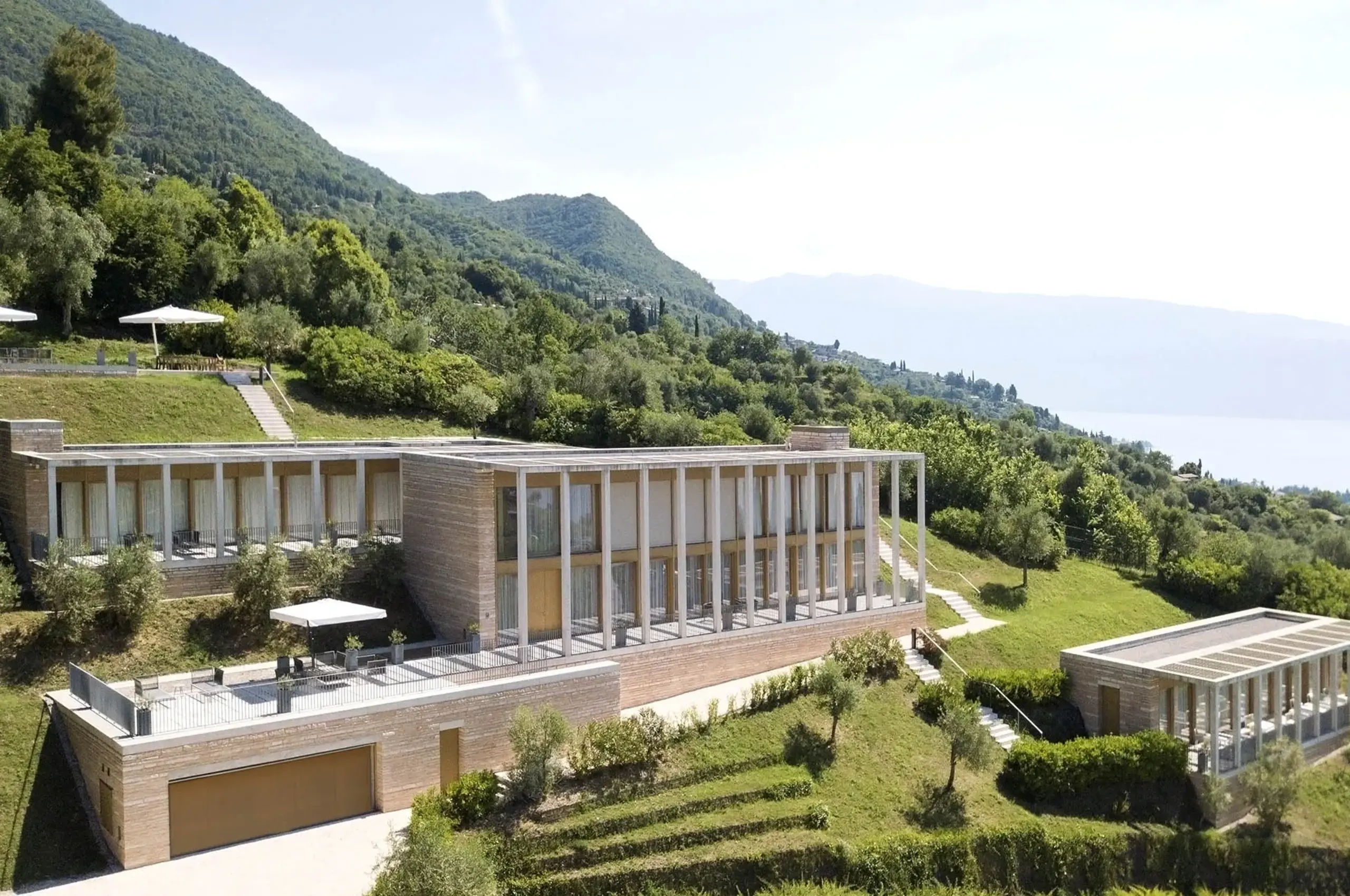 villa-nova-exterior-architecture-hillside-luxury-rental-lakegarda