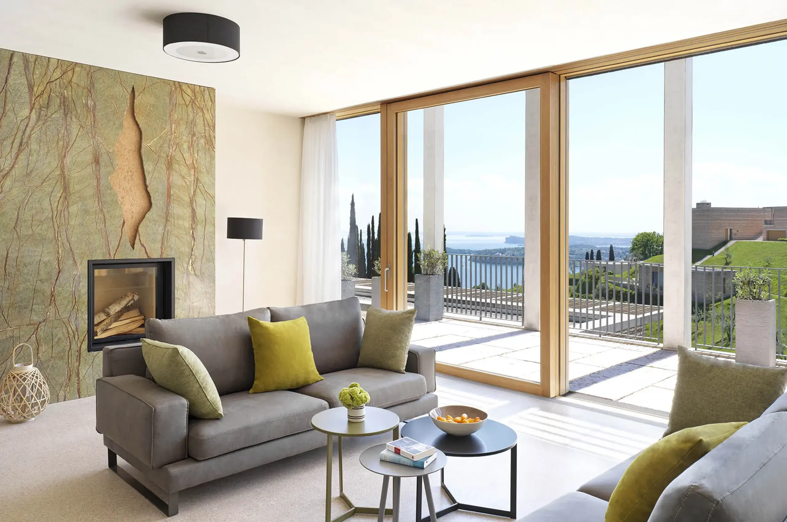 villa-nova-guesthouse-livingroom-fireplace-balcony-lakeview-luxury-lakegarda